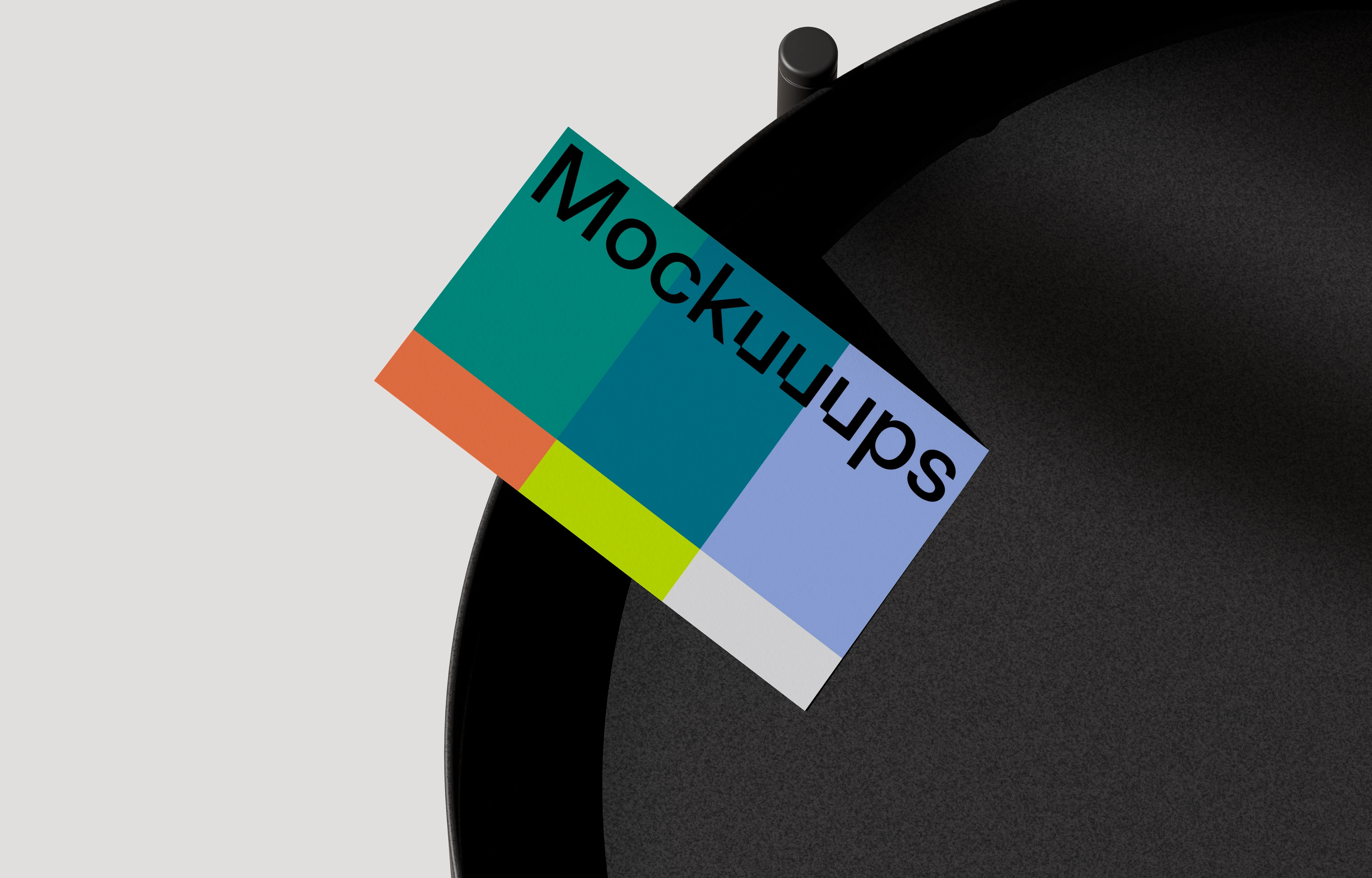 EU business card mockup on a black round table