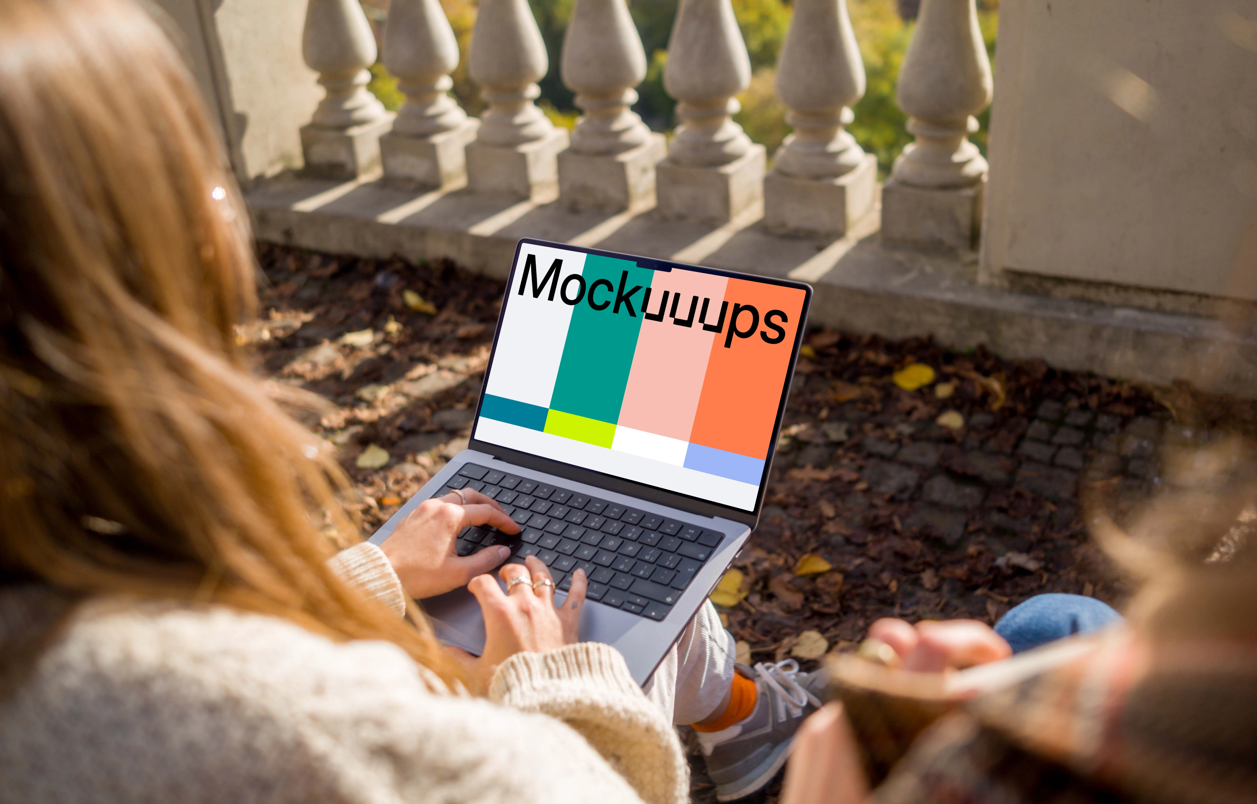 Female working on a MacBook Pro 14 in autumn theme mockup
