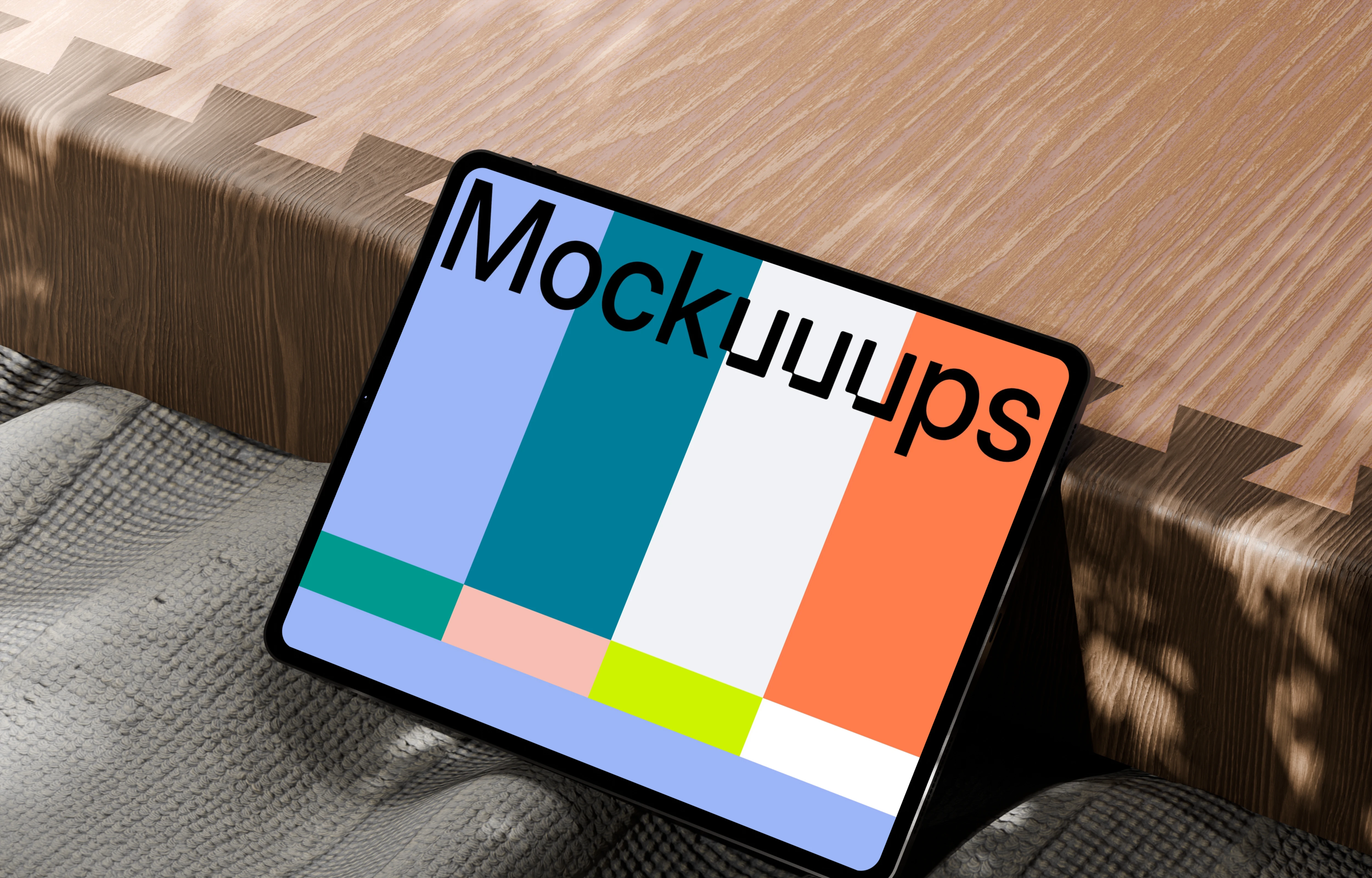 Free iPad Pro mockup on textured fabric and wooden surface