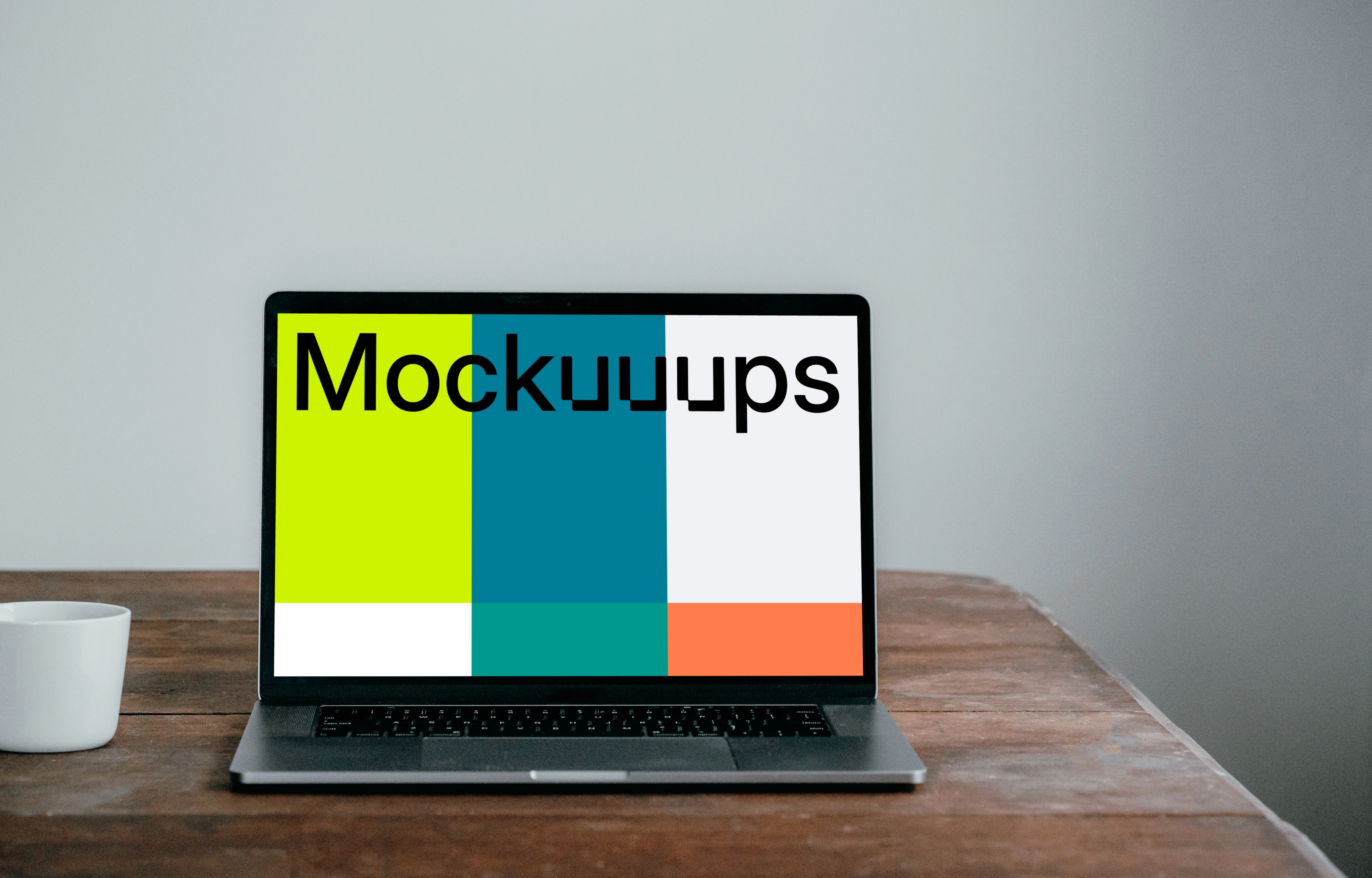 Front view of MacBook Pro mockup on a wooden table