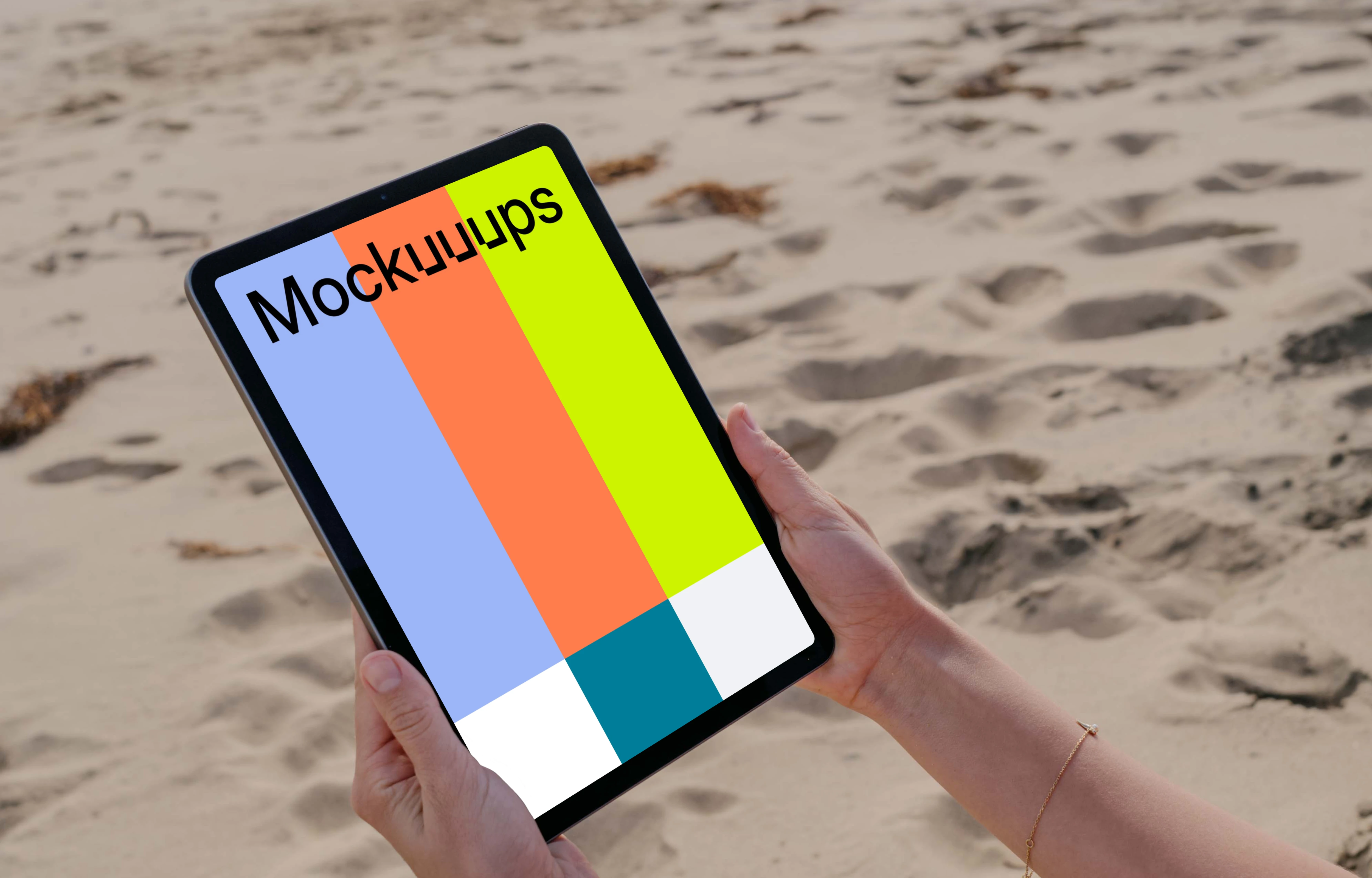 iPad Air mockup held by a user at the beach