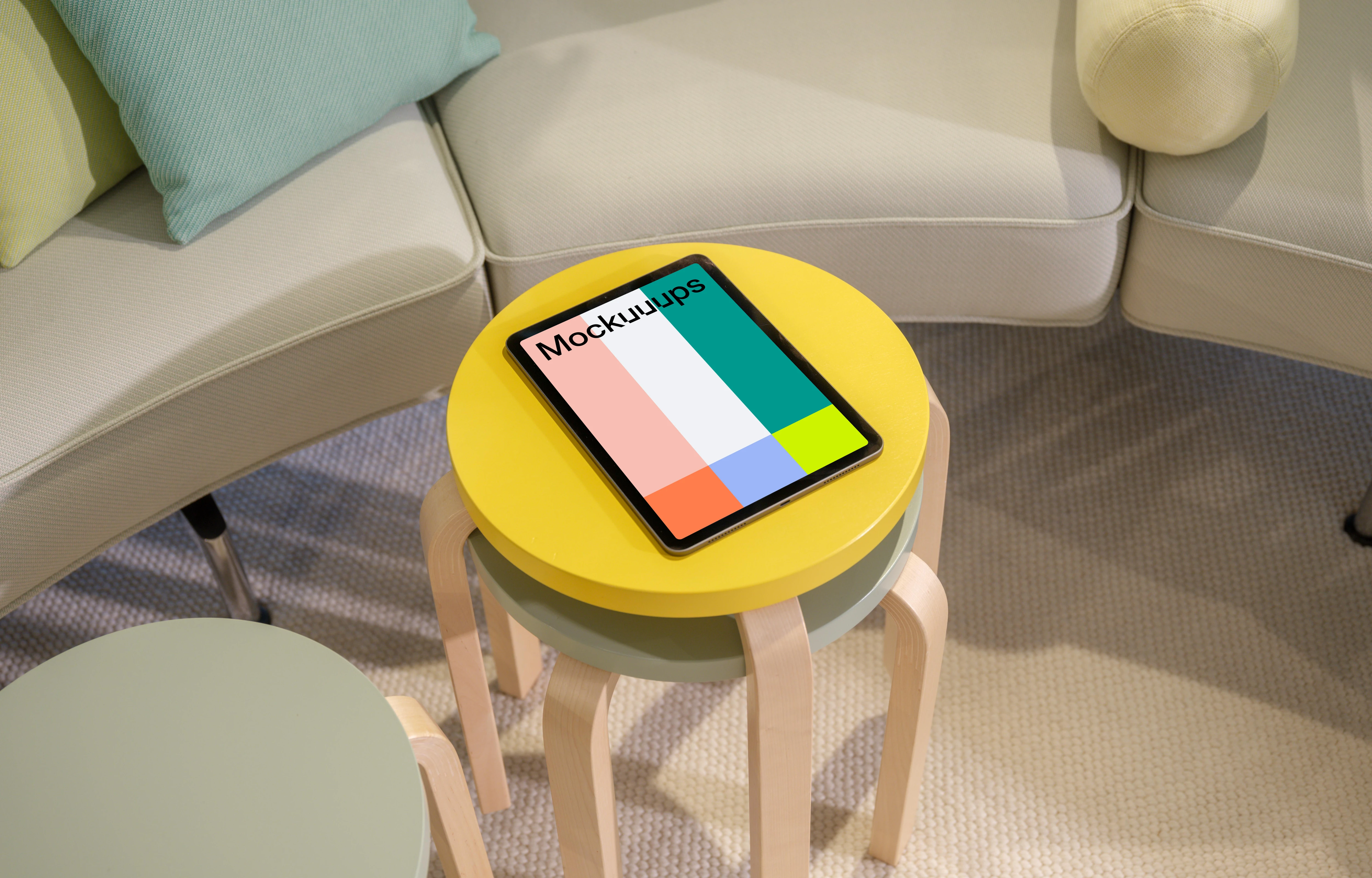iPad Air mockup on a modern living room side table