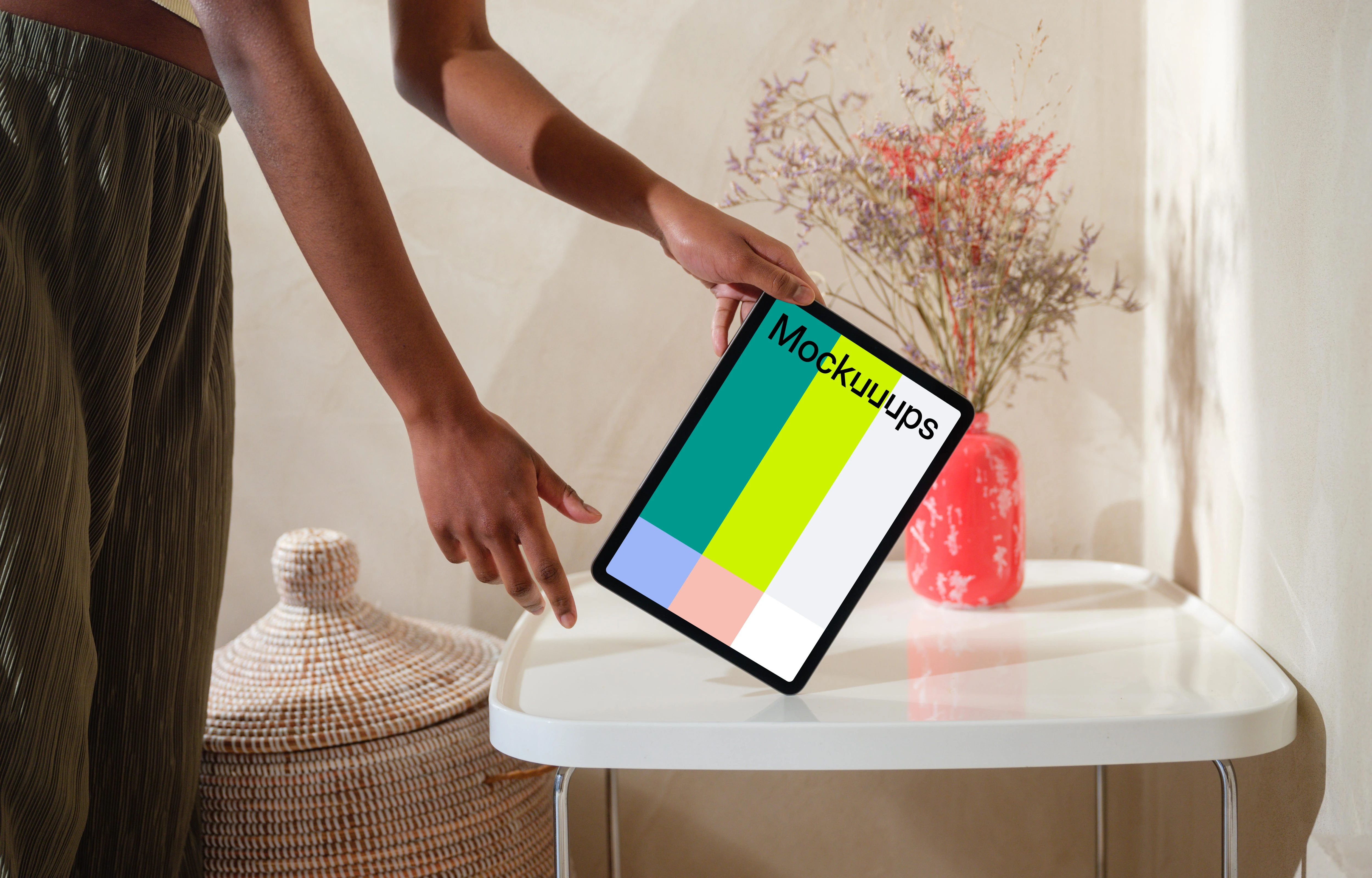 iPad Air mockup with female hand on a modern white table