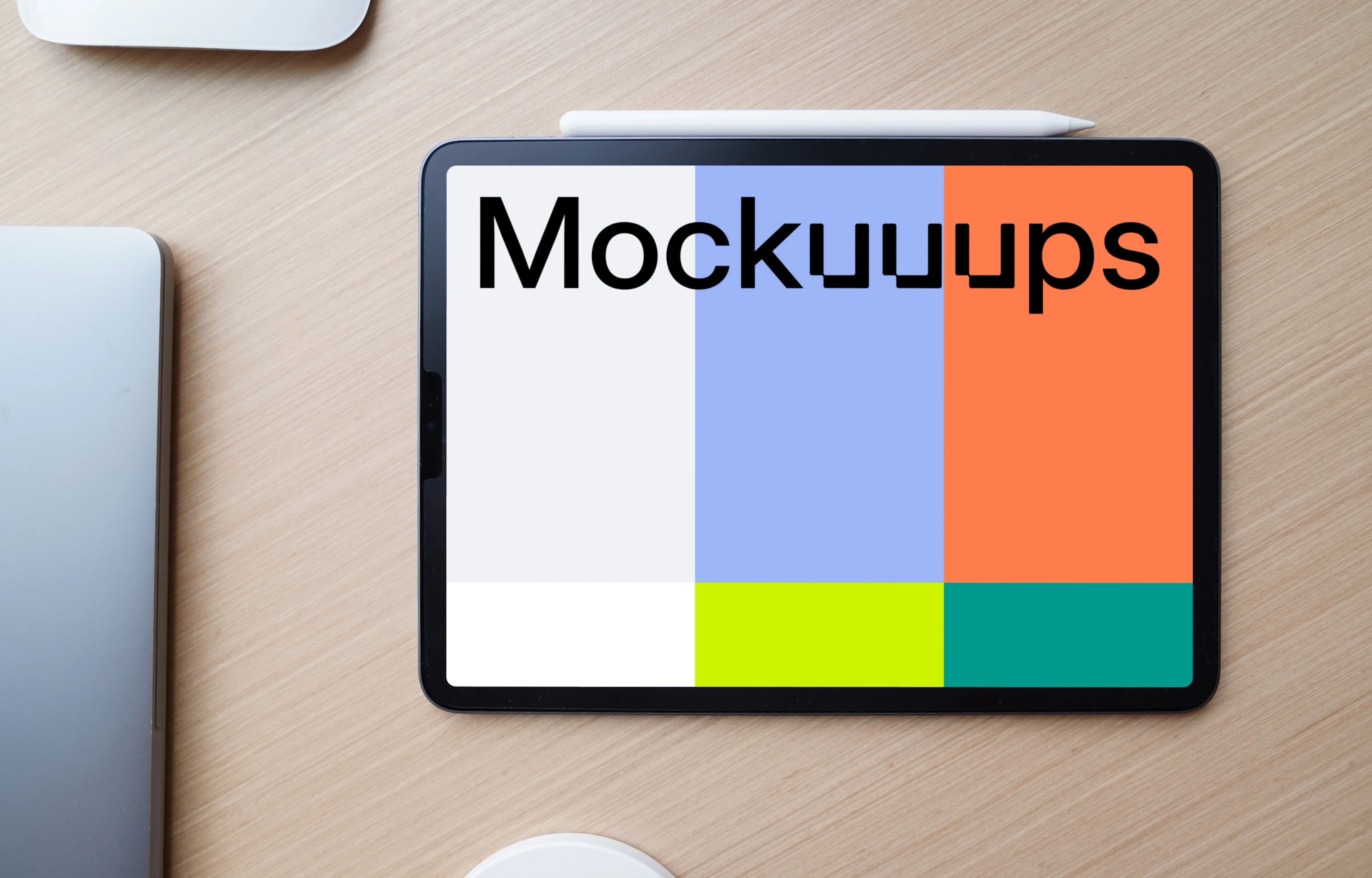 iPad mockup with pen on office desk
