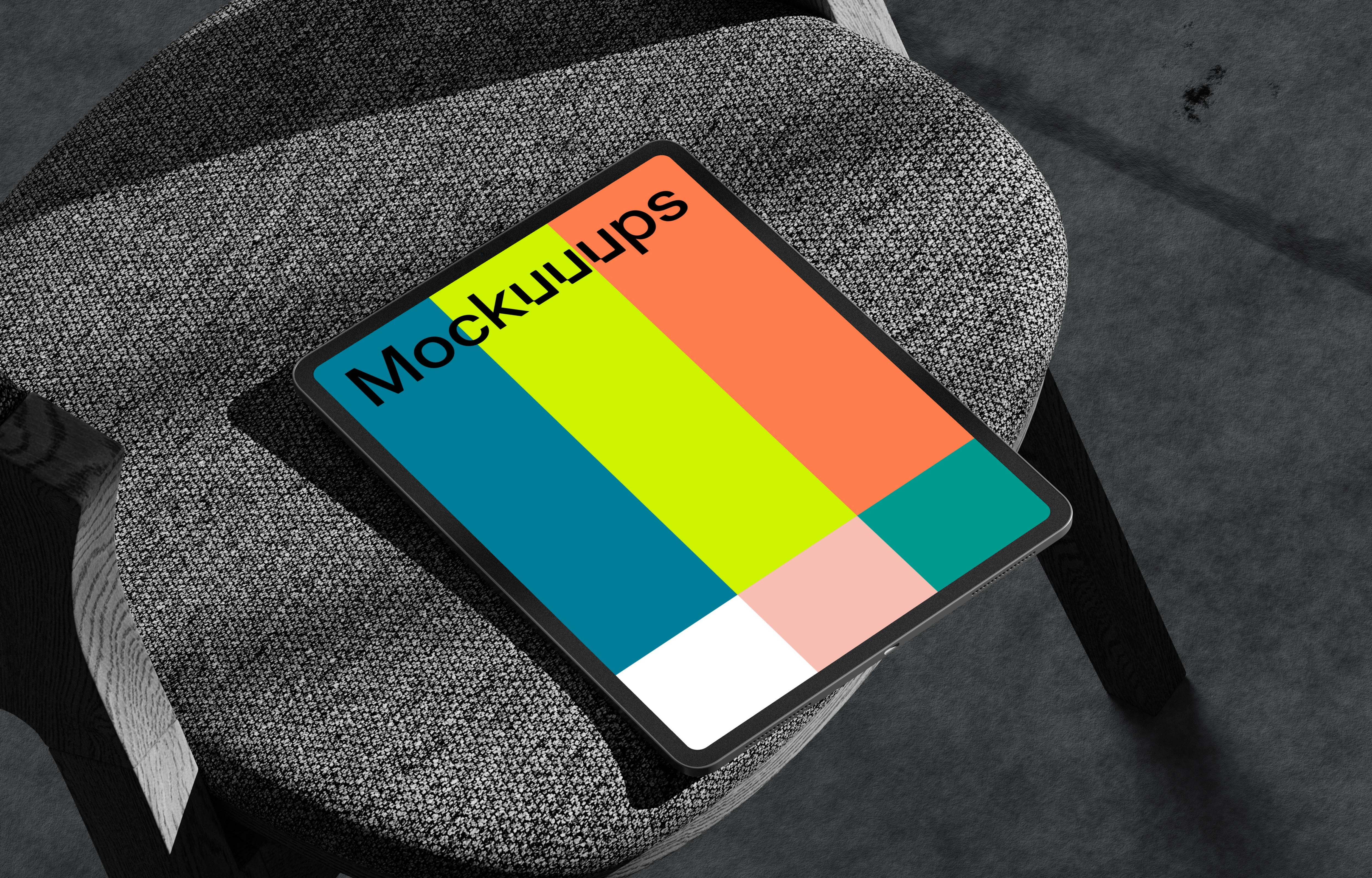 iPad Pro mockup on textured armchair with shadow play