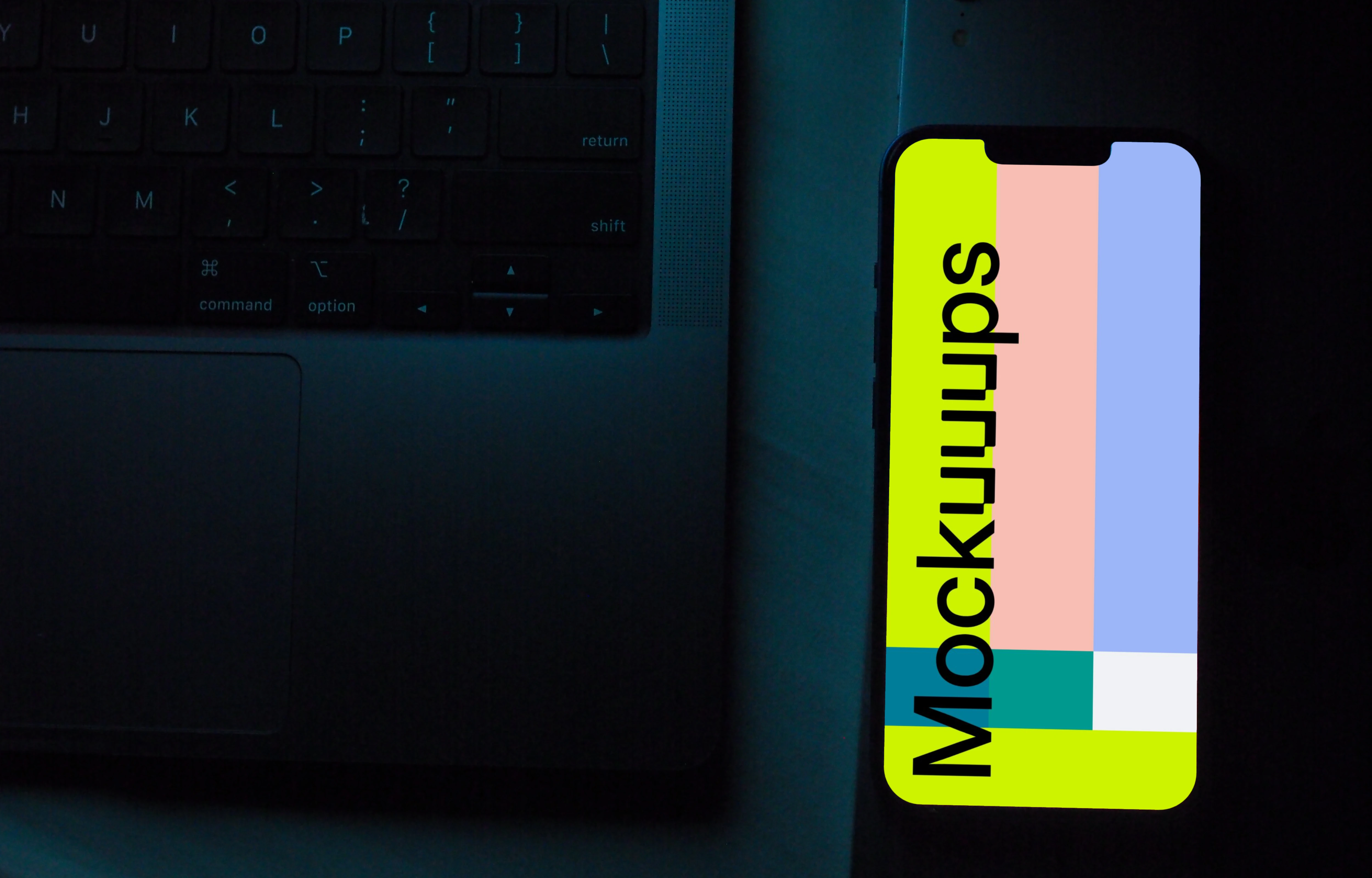 iPhone 13 mockup with a laptop