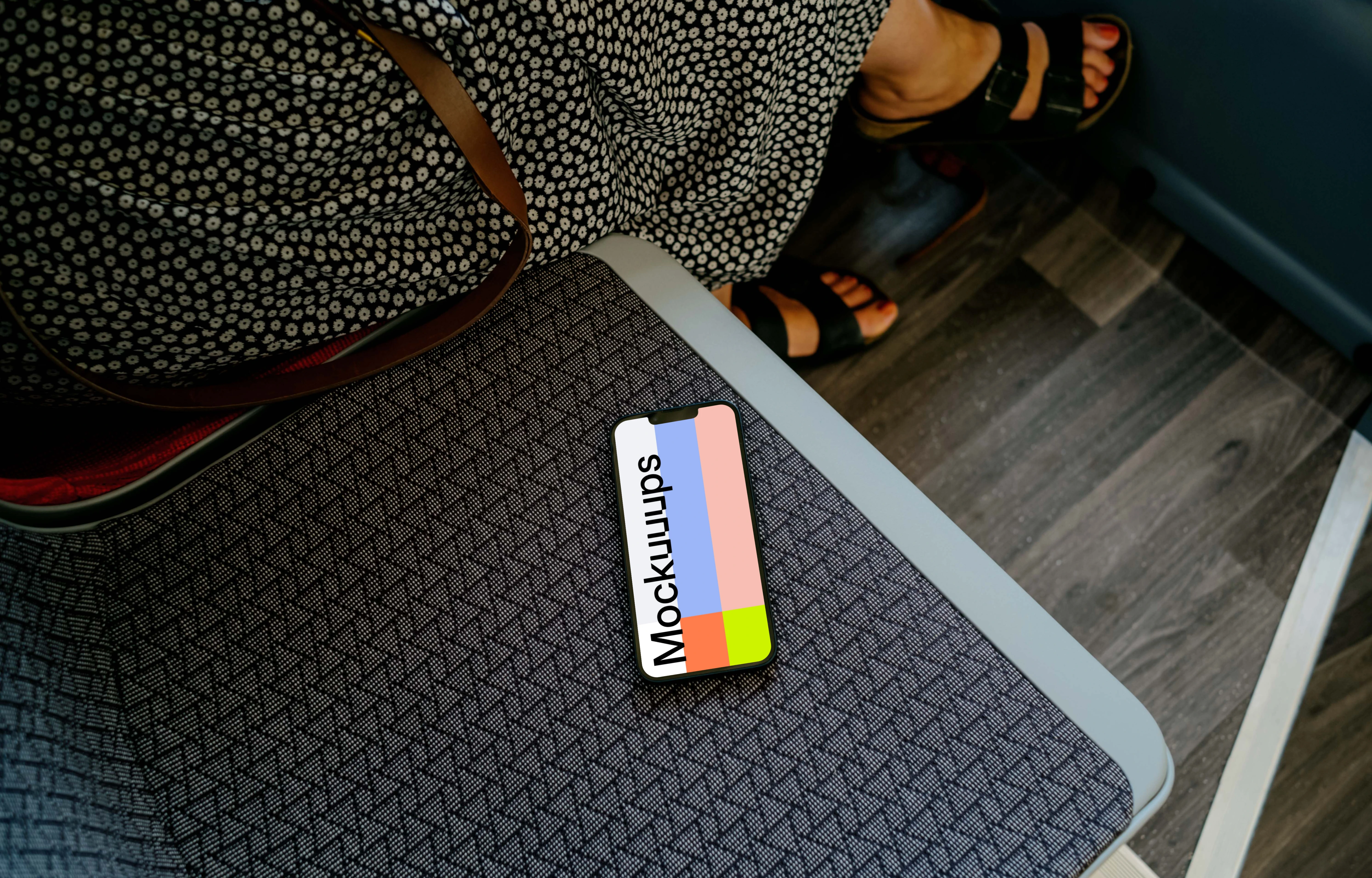 iPhone 13 on passenger seat