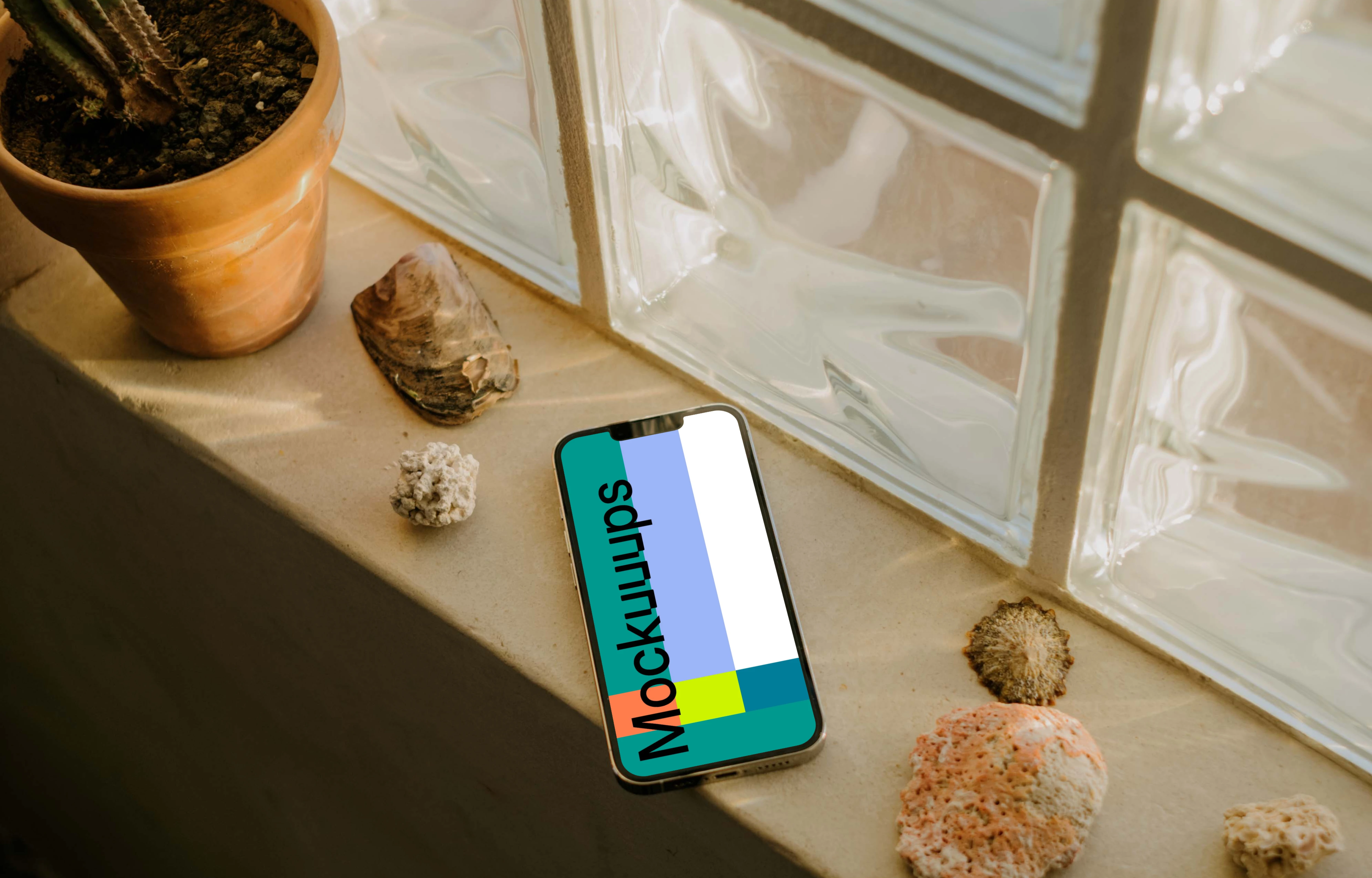 iPhone 13 Pro mockup on a window ledge