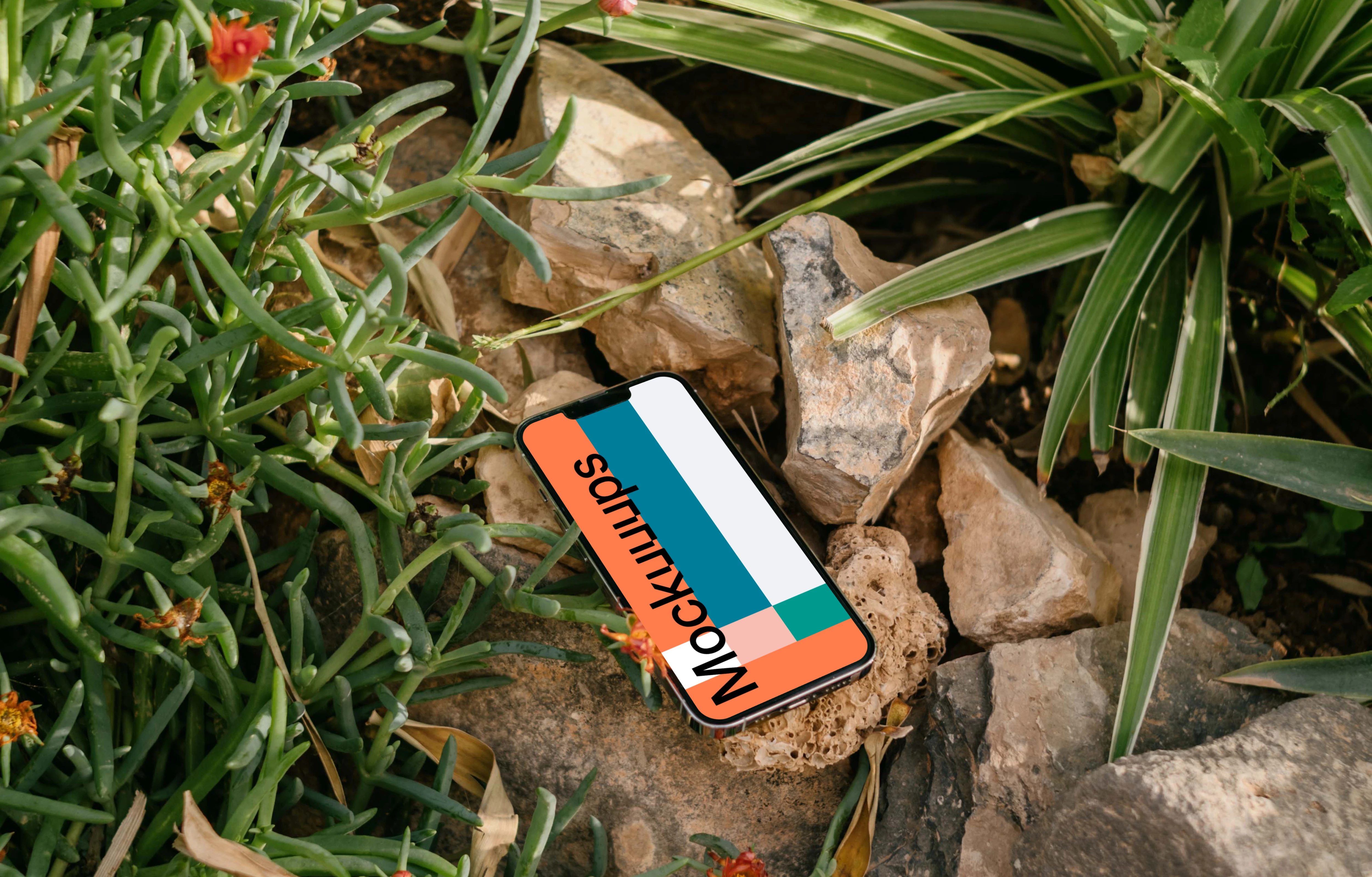 iPhone 13 Pro mockup placed in a garden