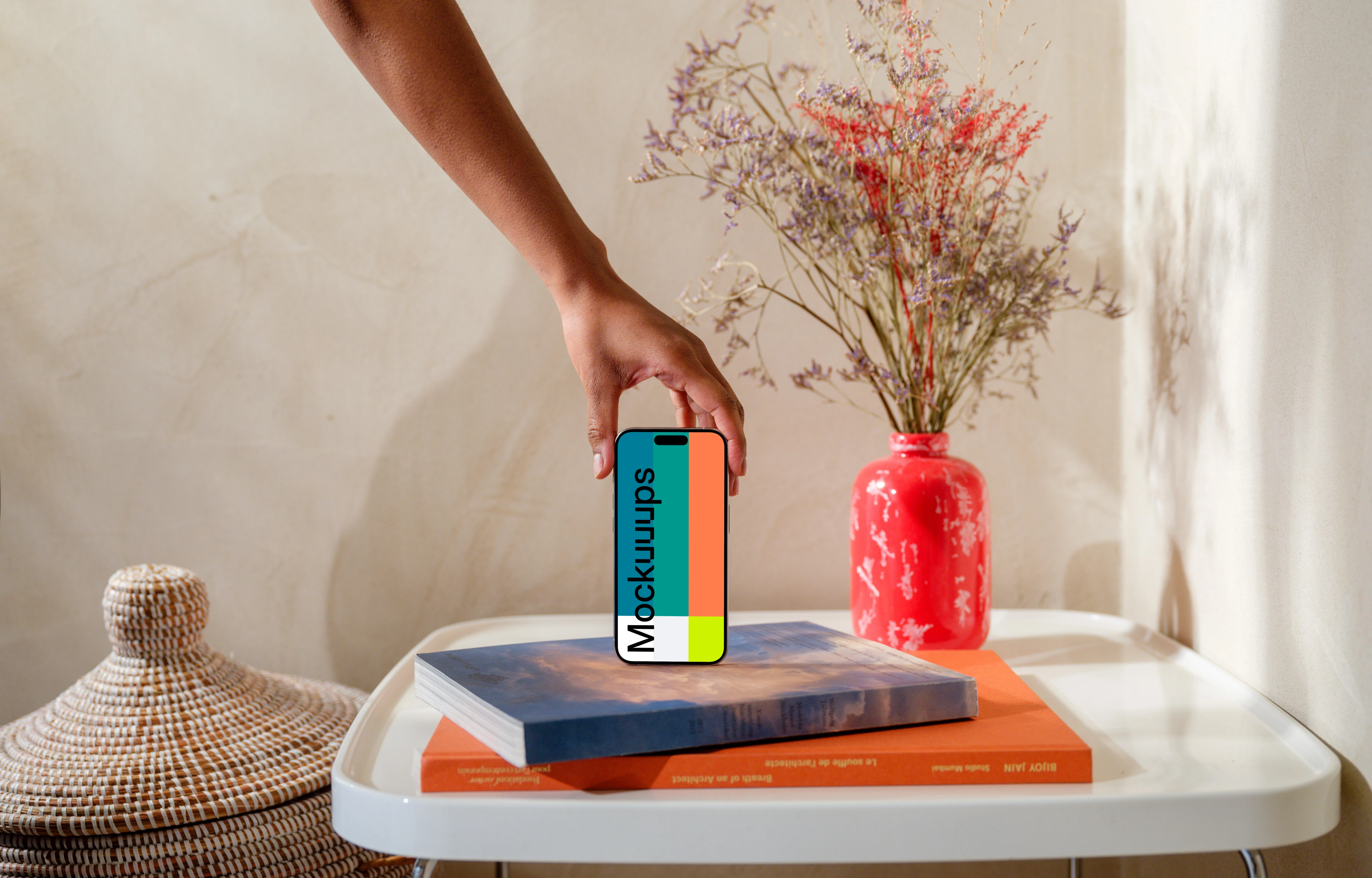 iPhone 15 Pro mockup in a woman's hand on a modern home setting