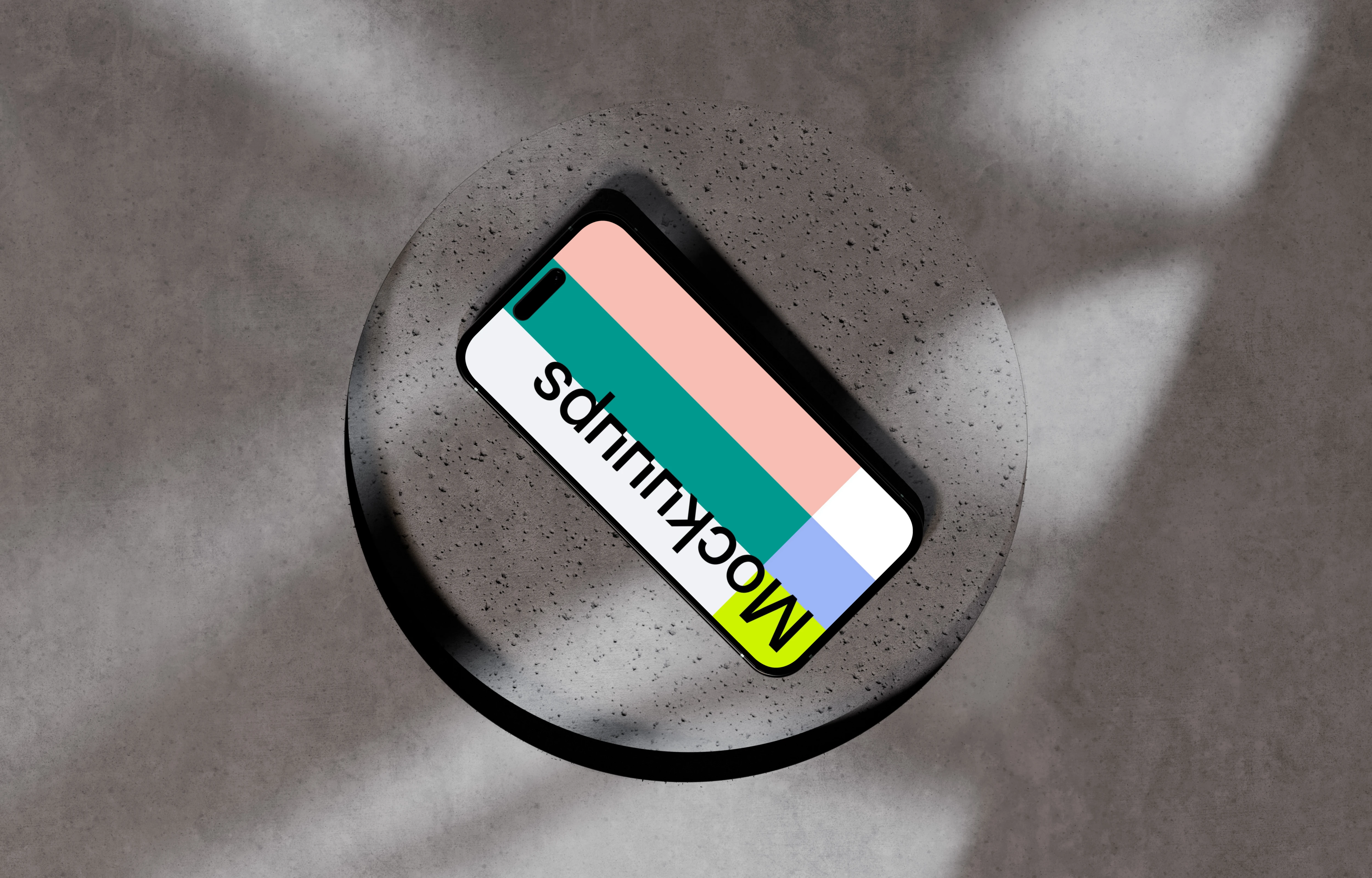 iPhone 16 mockup on a textured concrete surface