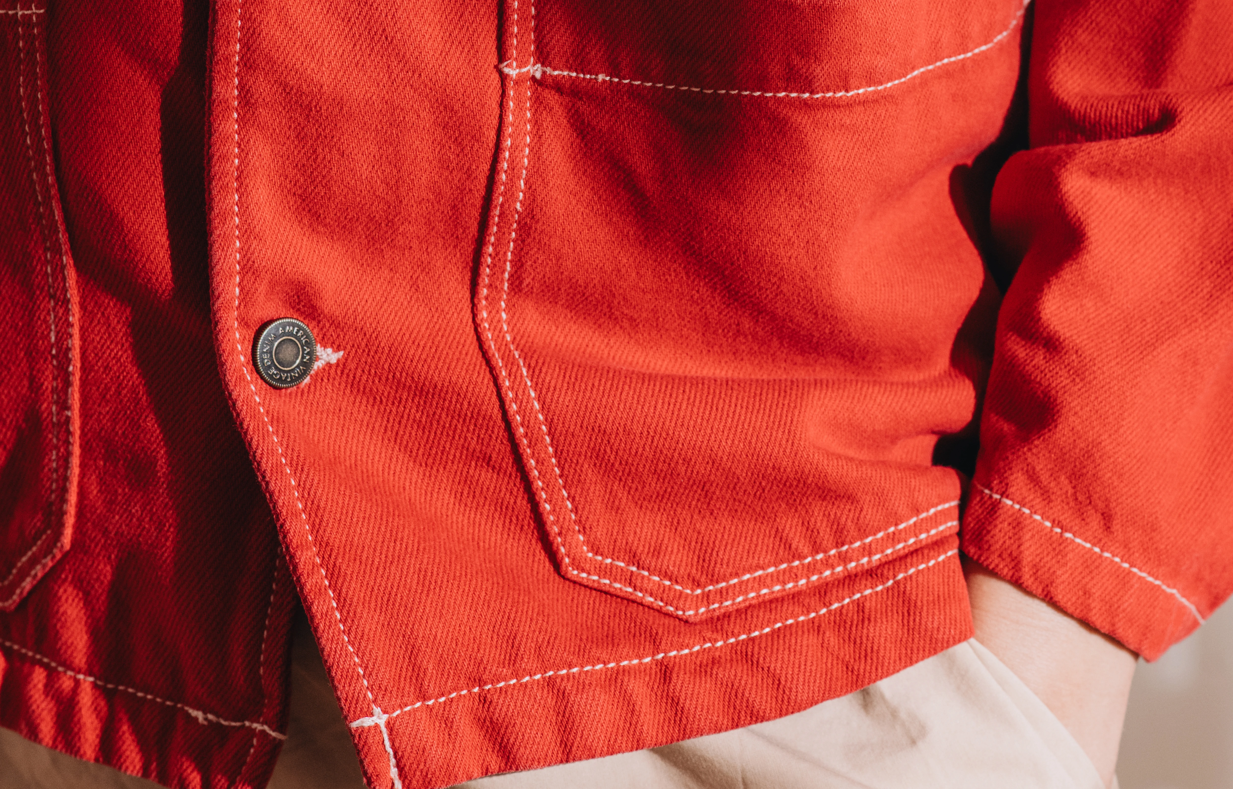 iPhone 17 Pro mockup in a red jacket pocket