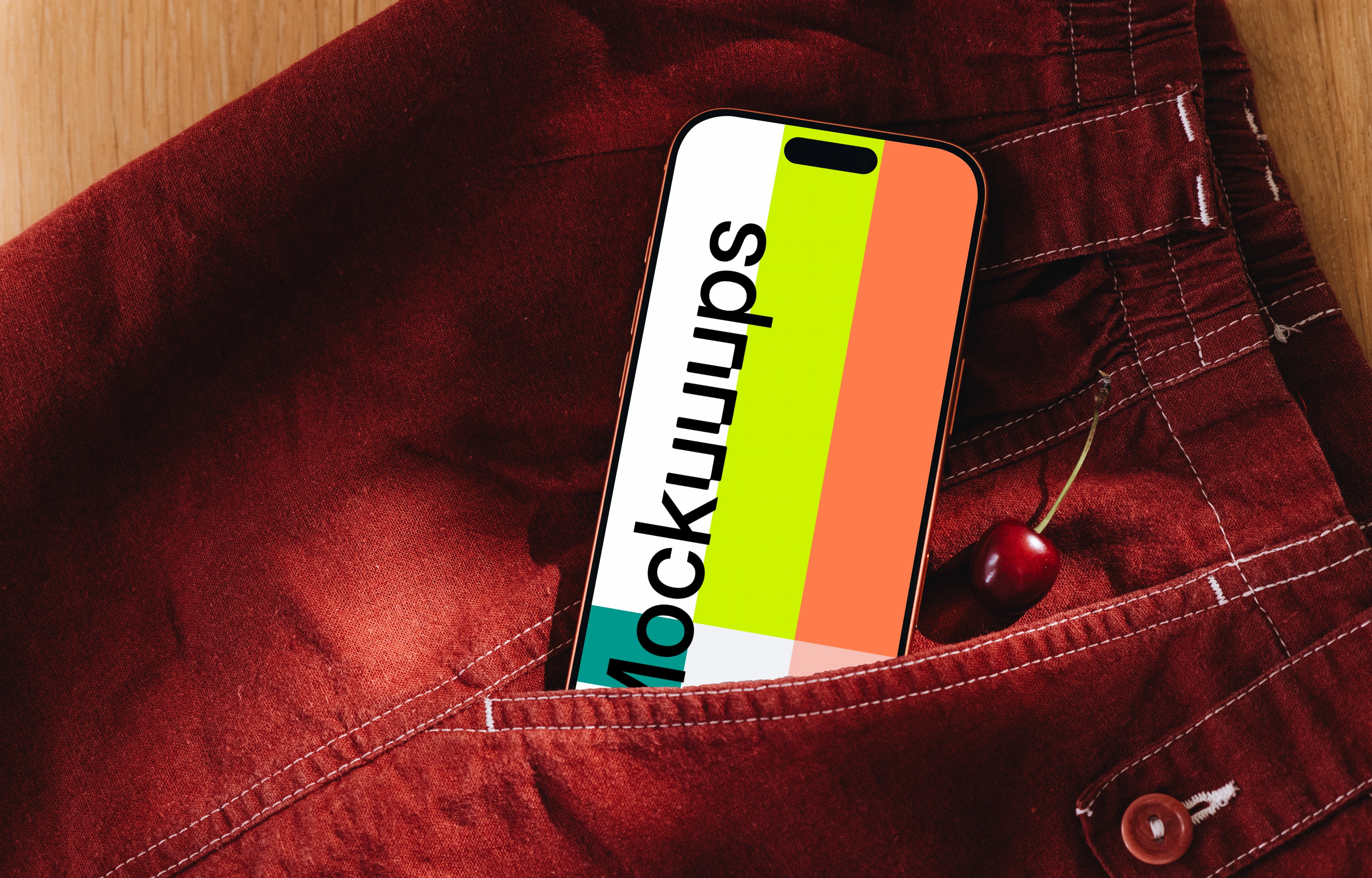 iPhone 17 Pro mockup in red fabric pocket with cherry