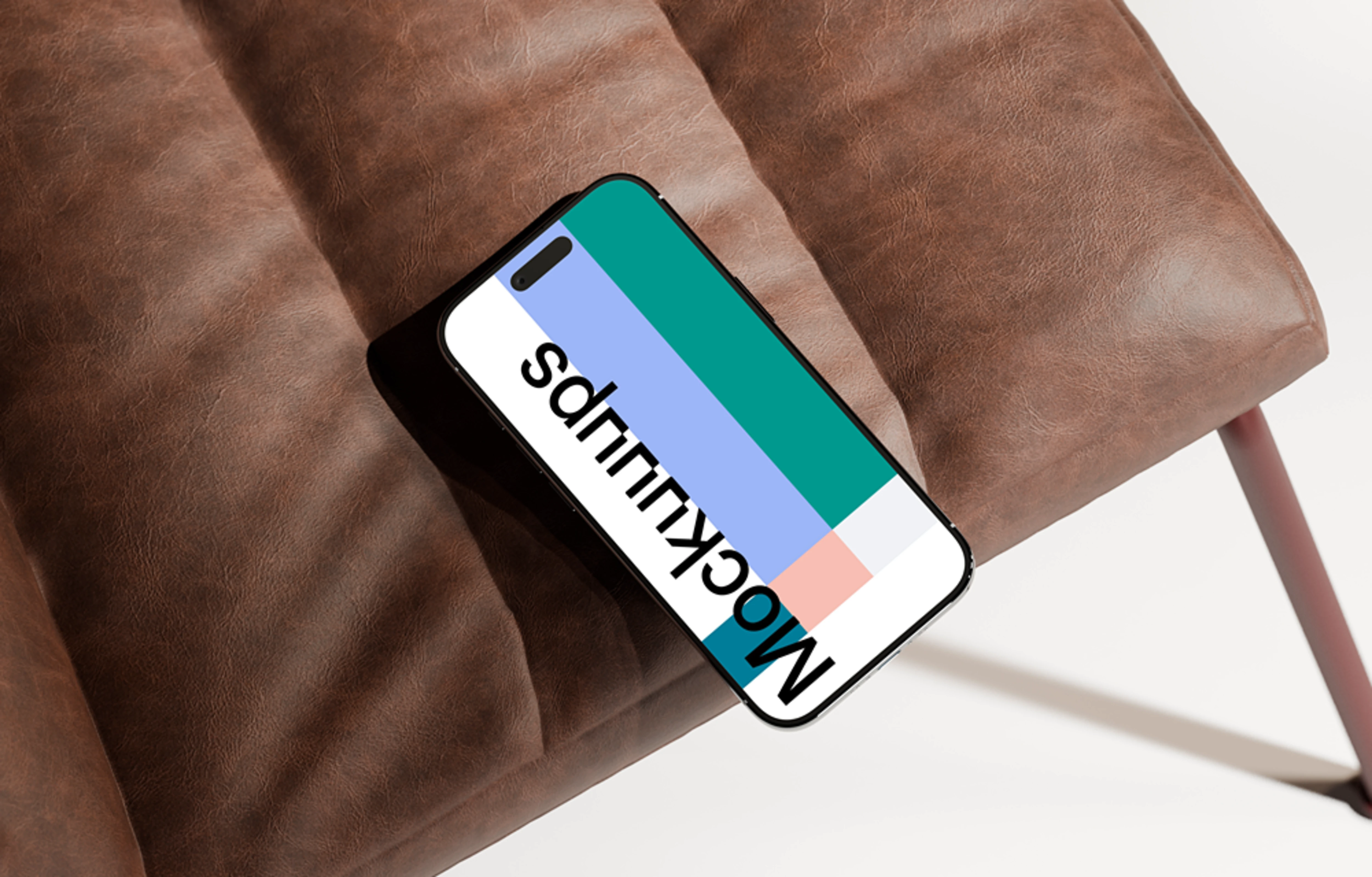 iPhone Air mockup on a brown leather chair