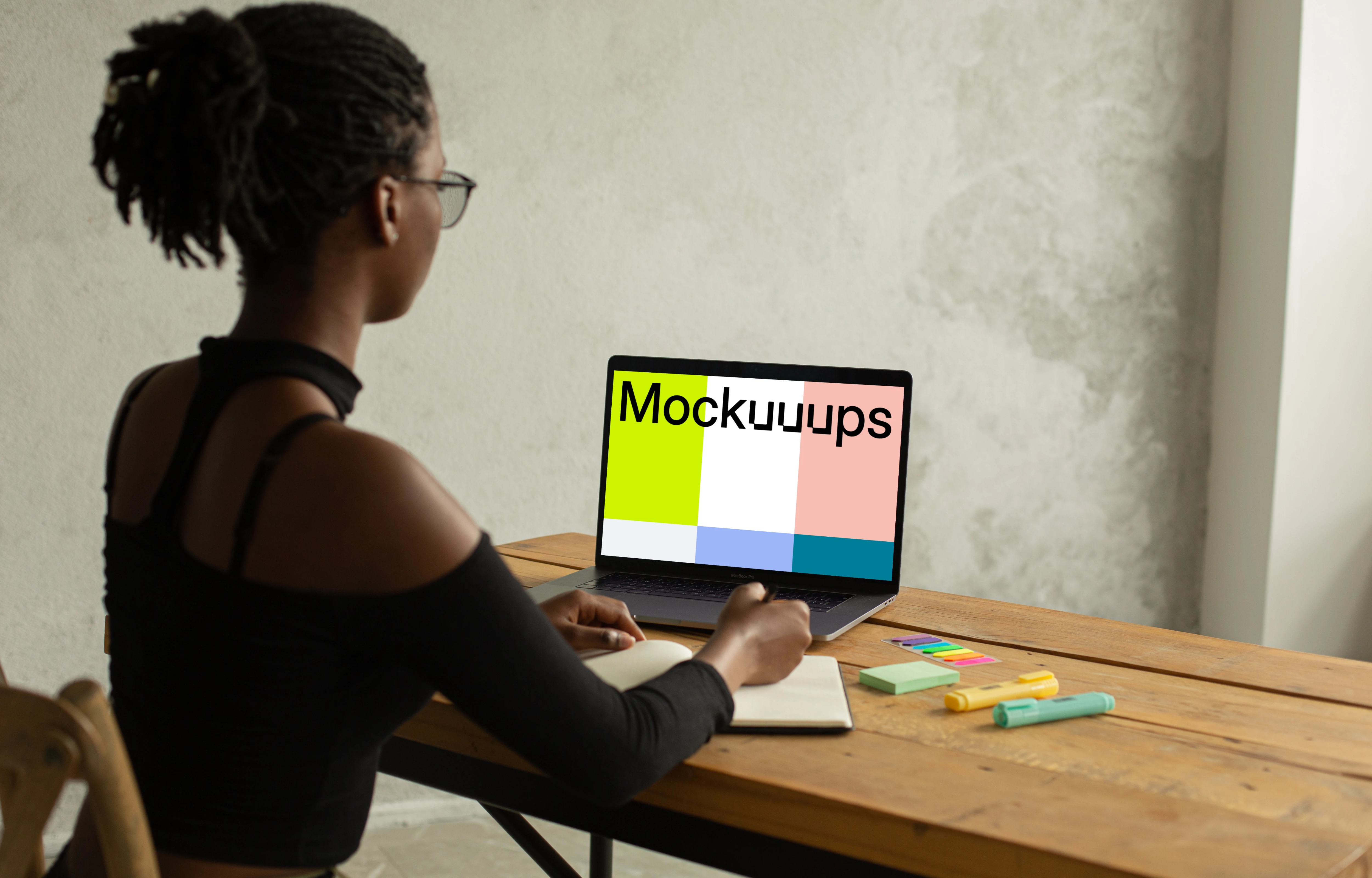 Lady typing on her MacBook Pro