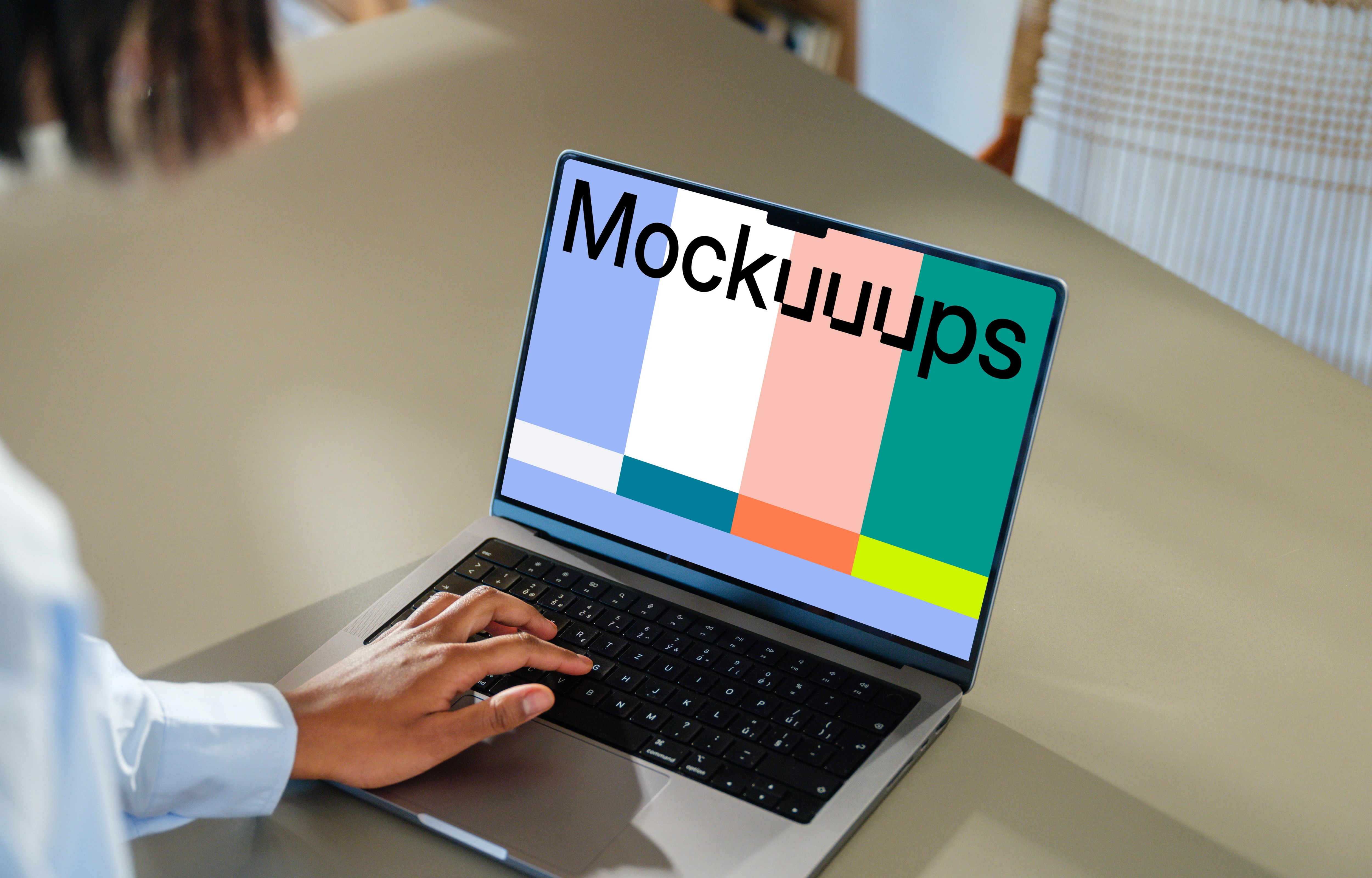 MacBook Pro 14-inch mockup at a modern desk