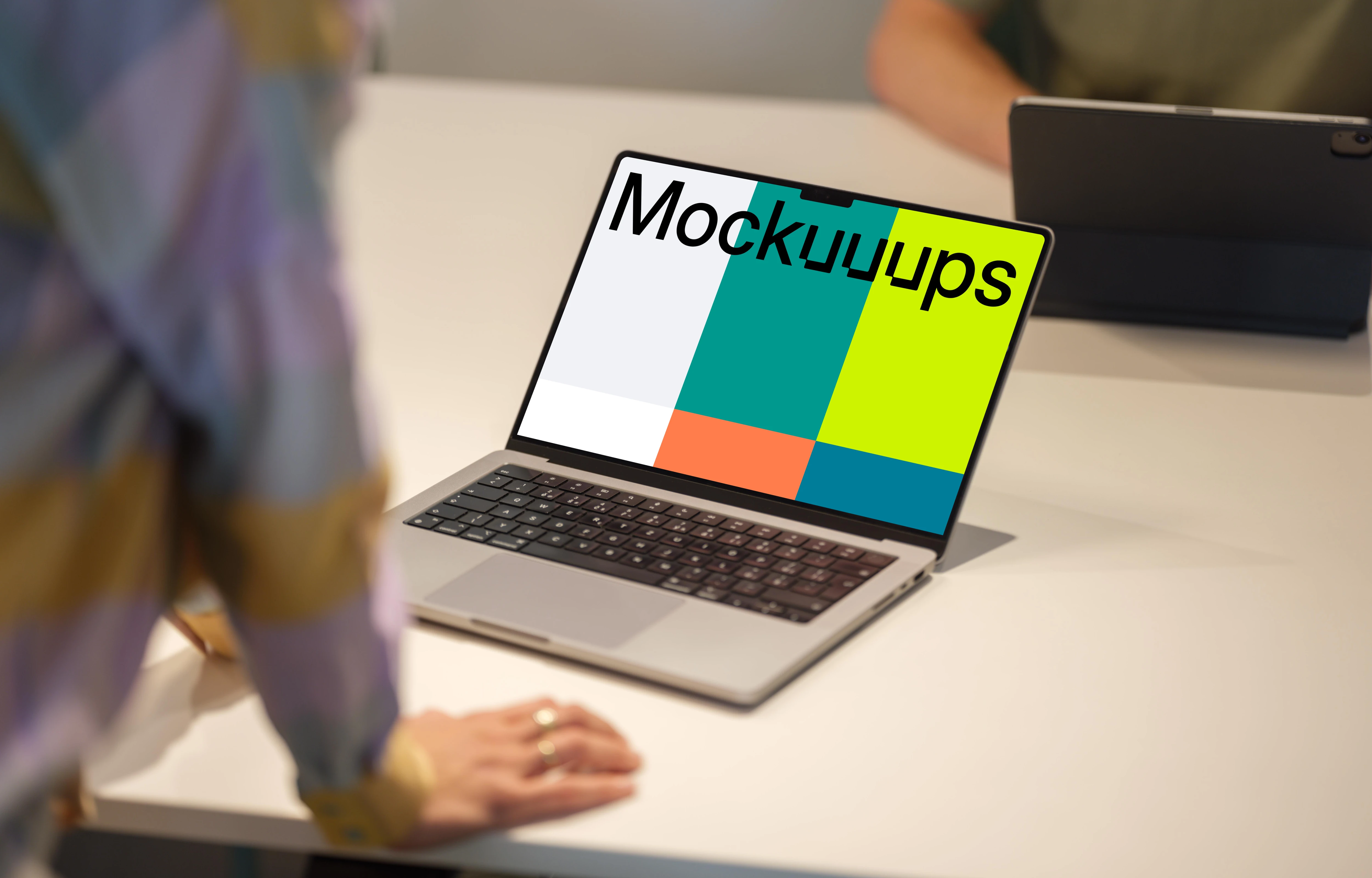 MacBook Pro 14 inch mockup on office desk with space for design