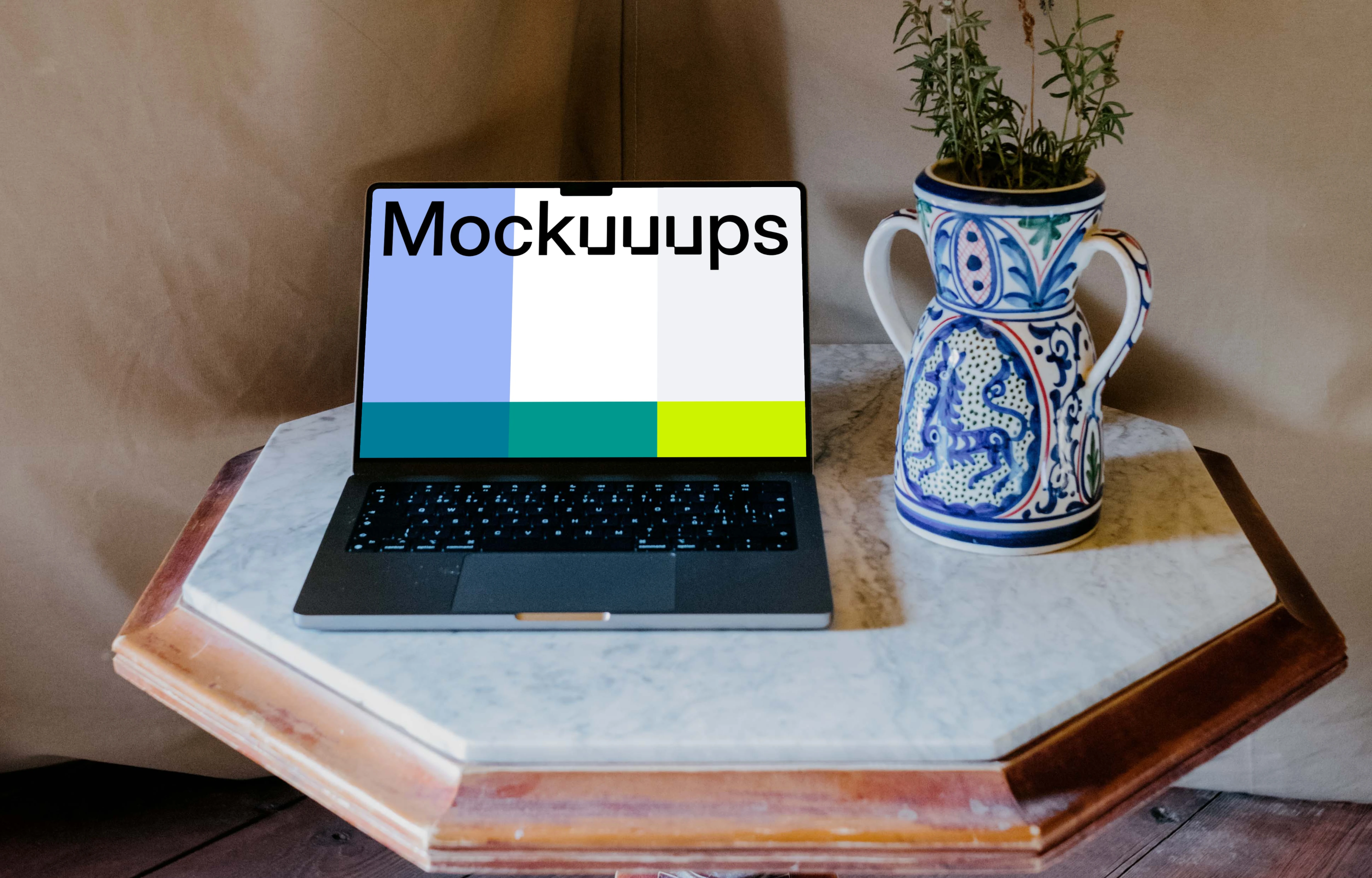 MacBook Pro mockup next to a potted plant