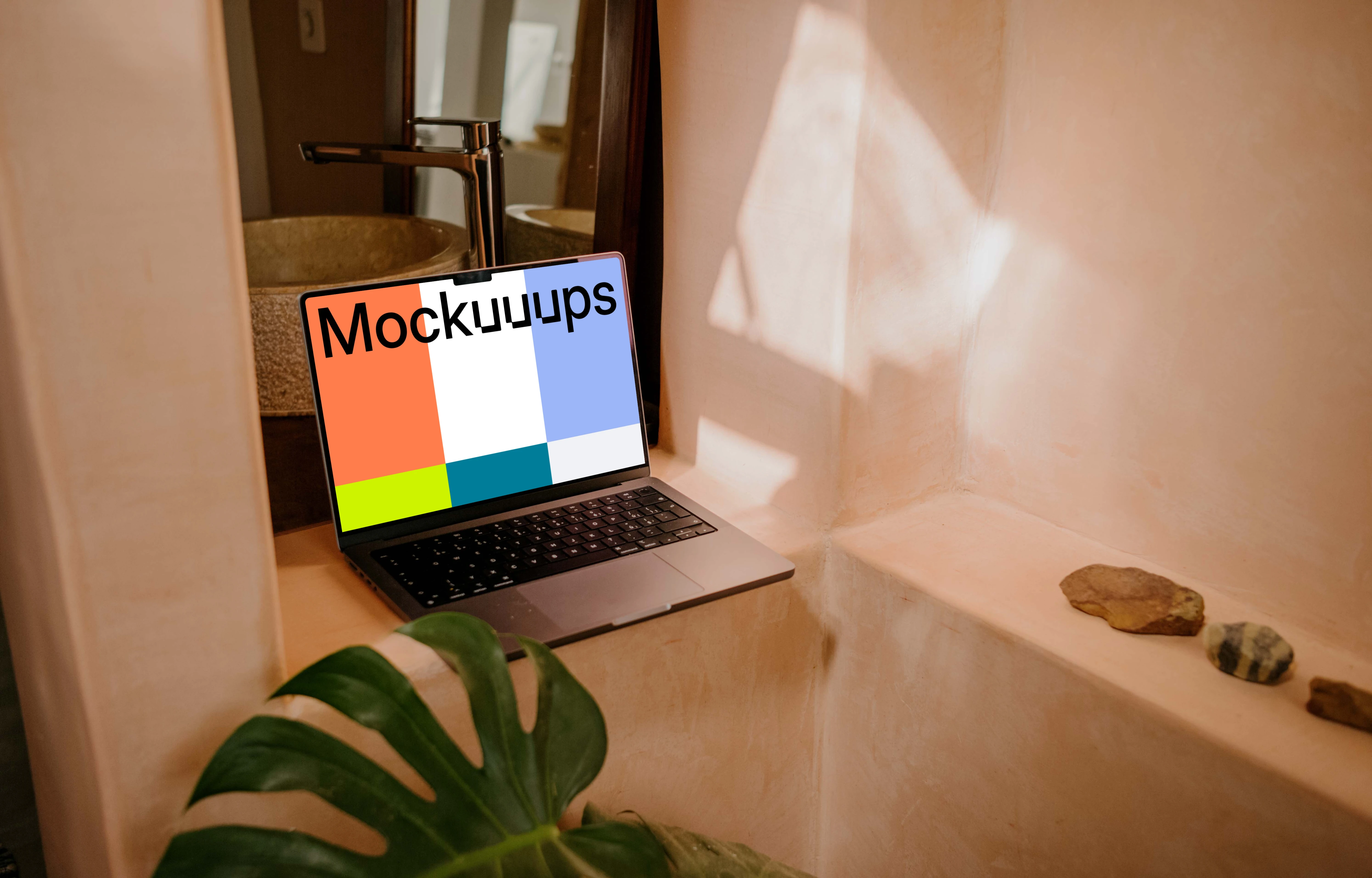 MacBook Pro mockup under a faucet