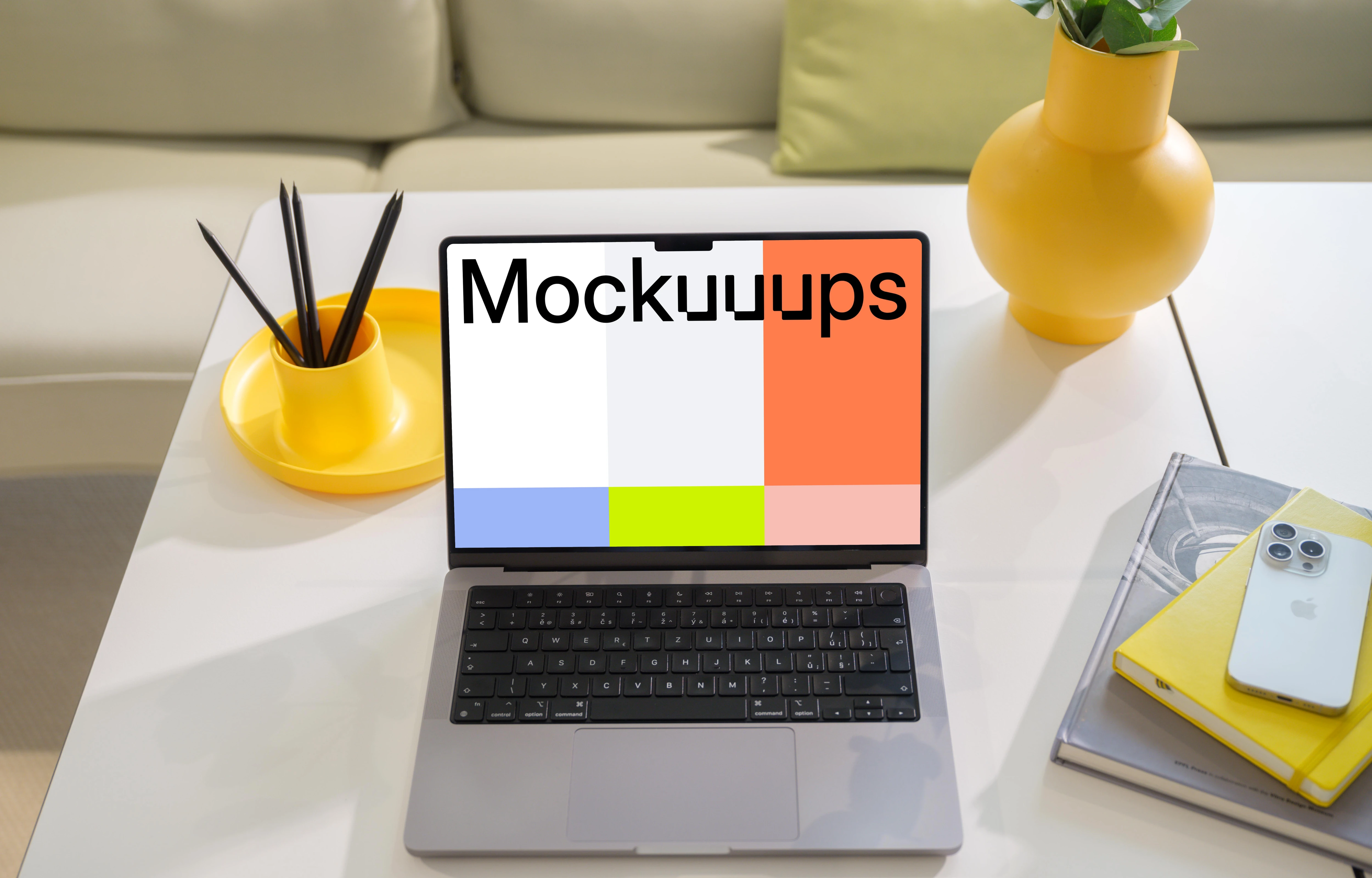 MacBook Pro 14-inch mockup on a modern white table