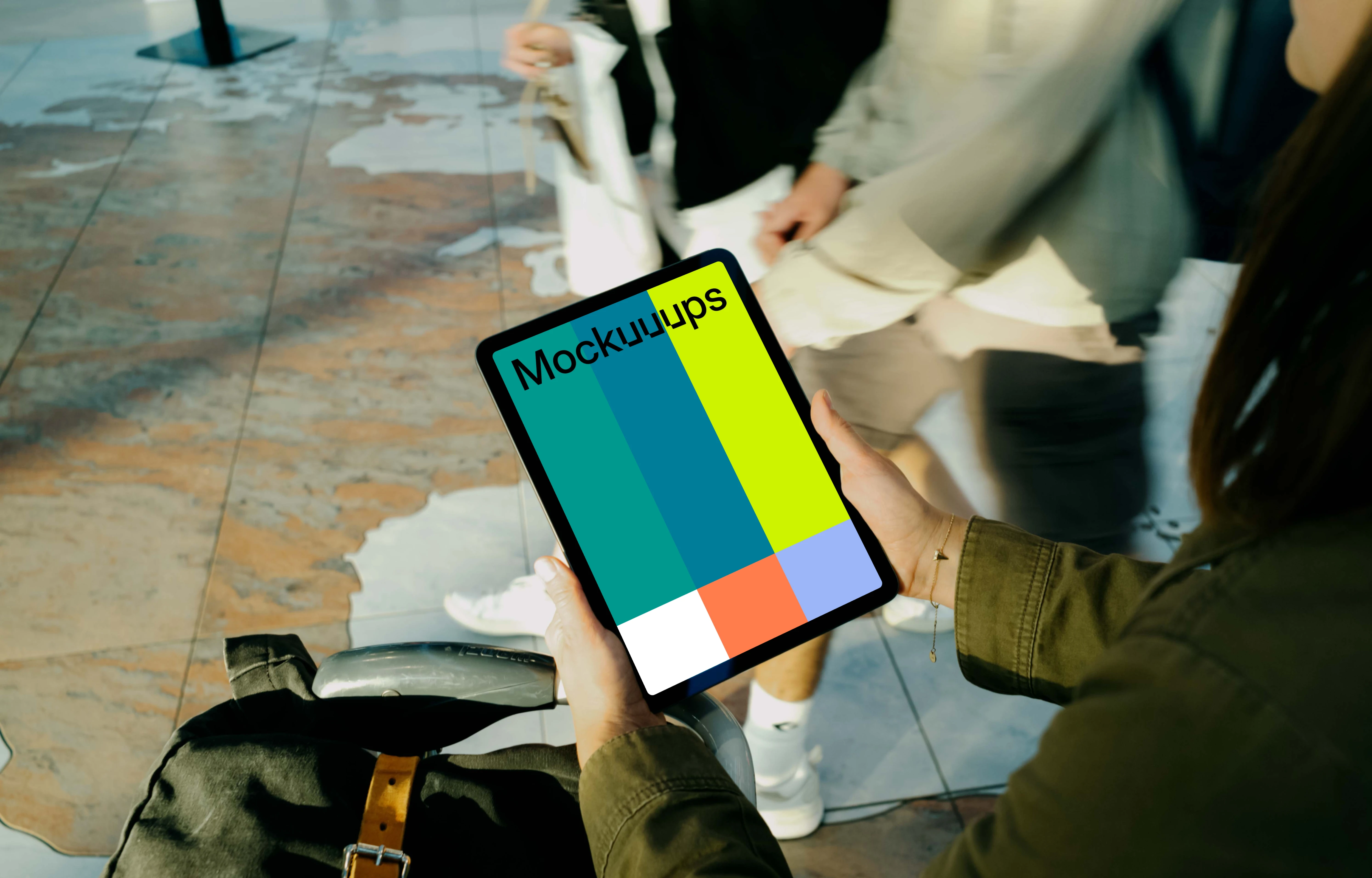 Female hands holding an iPad Air mockup