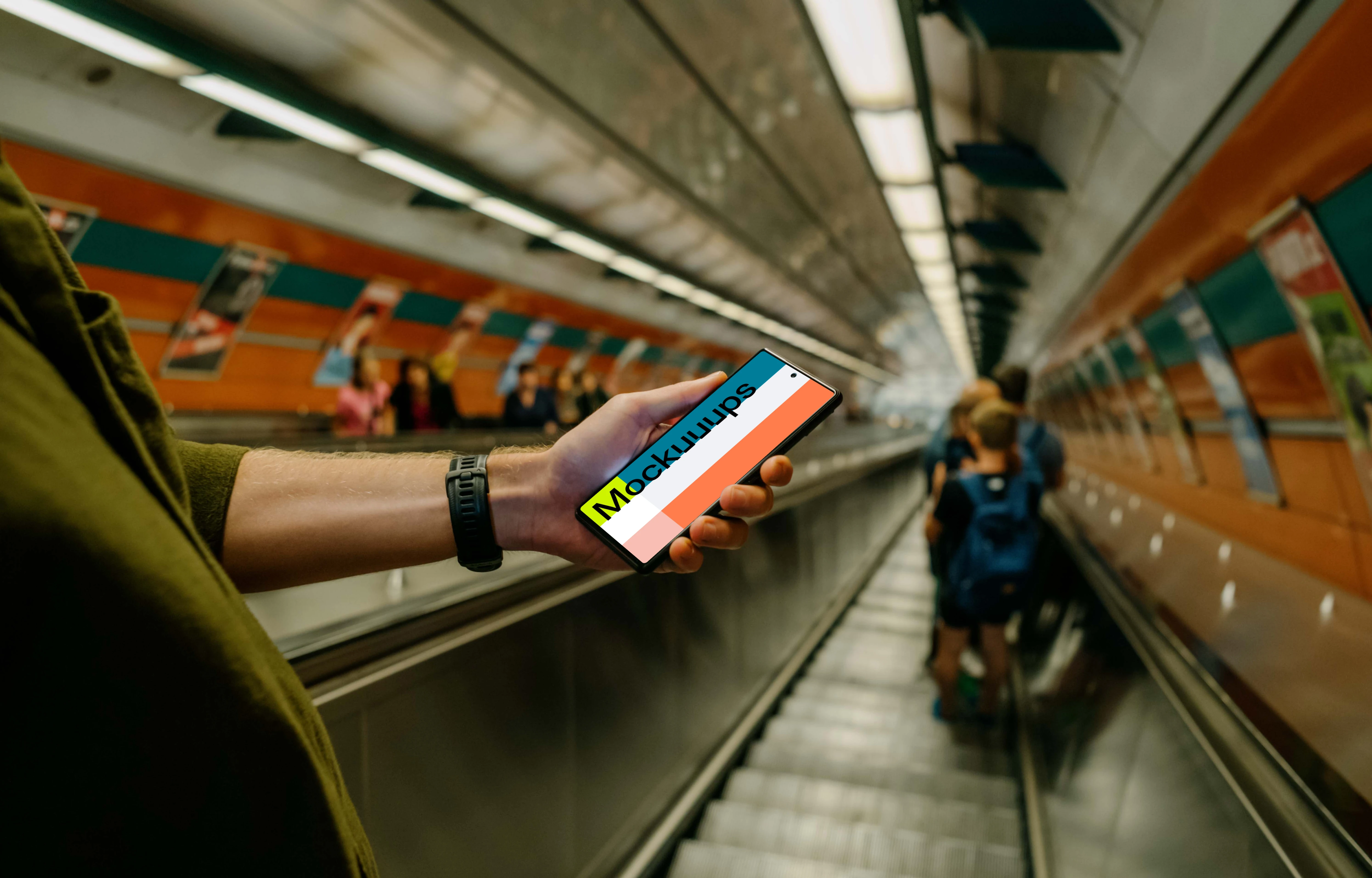 Person holding a smartphone mockup