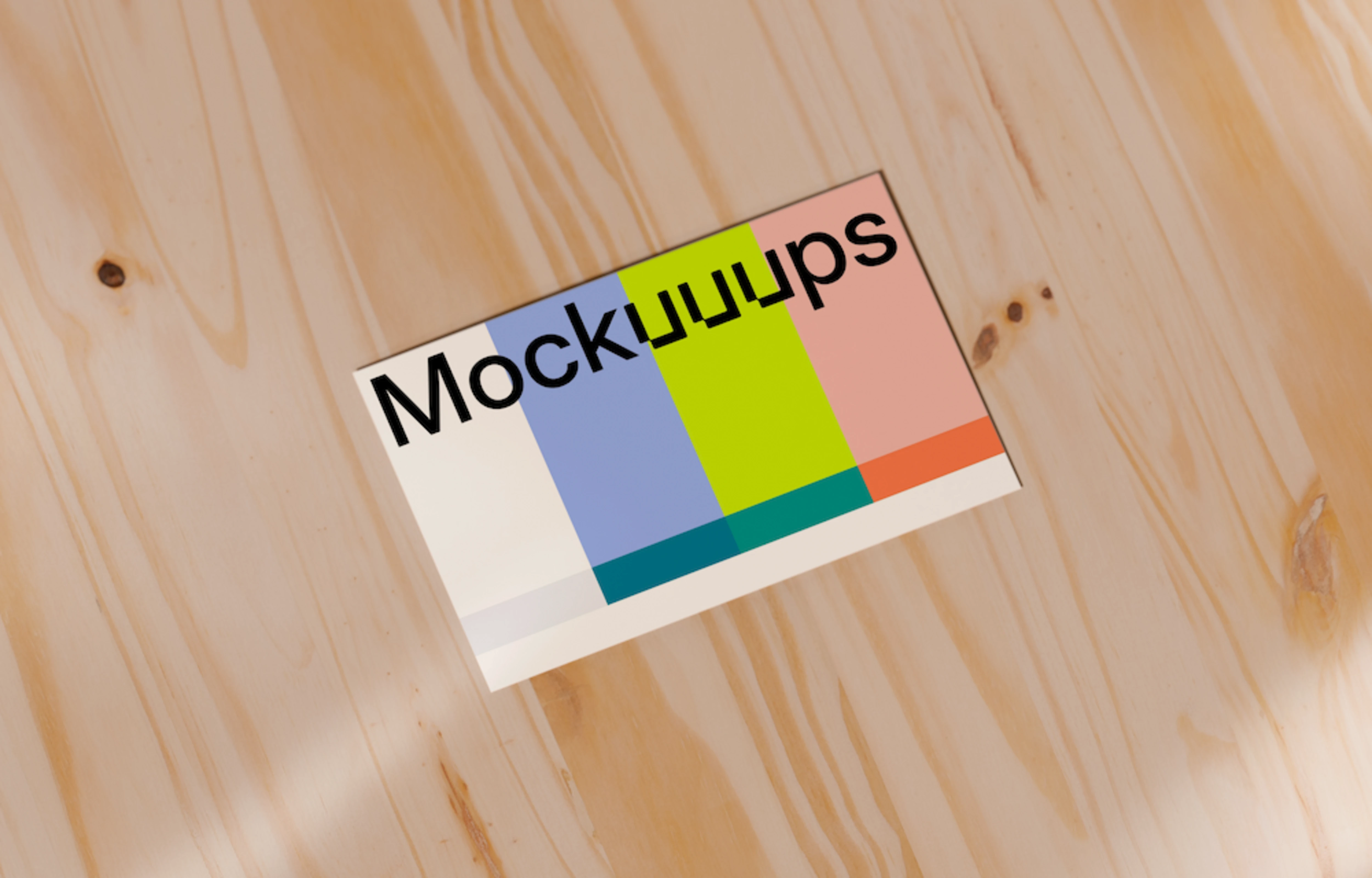 Single business card mockup on a wooden surface
