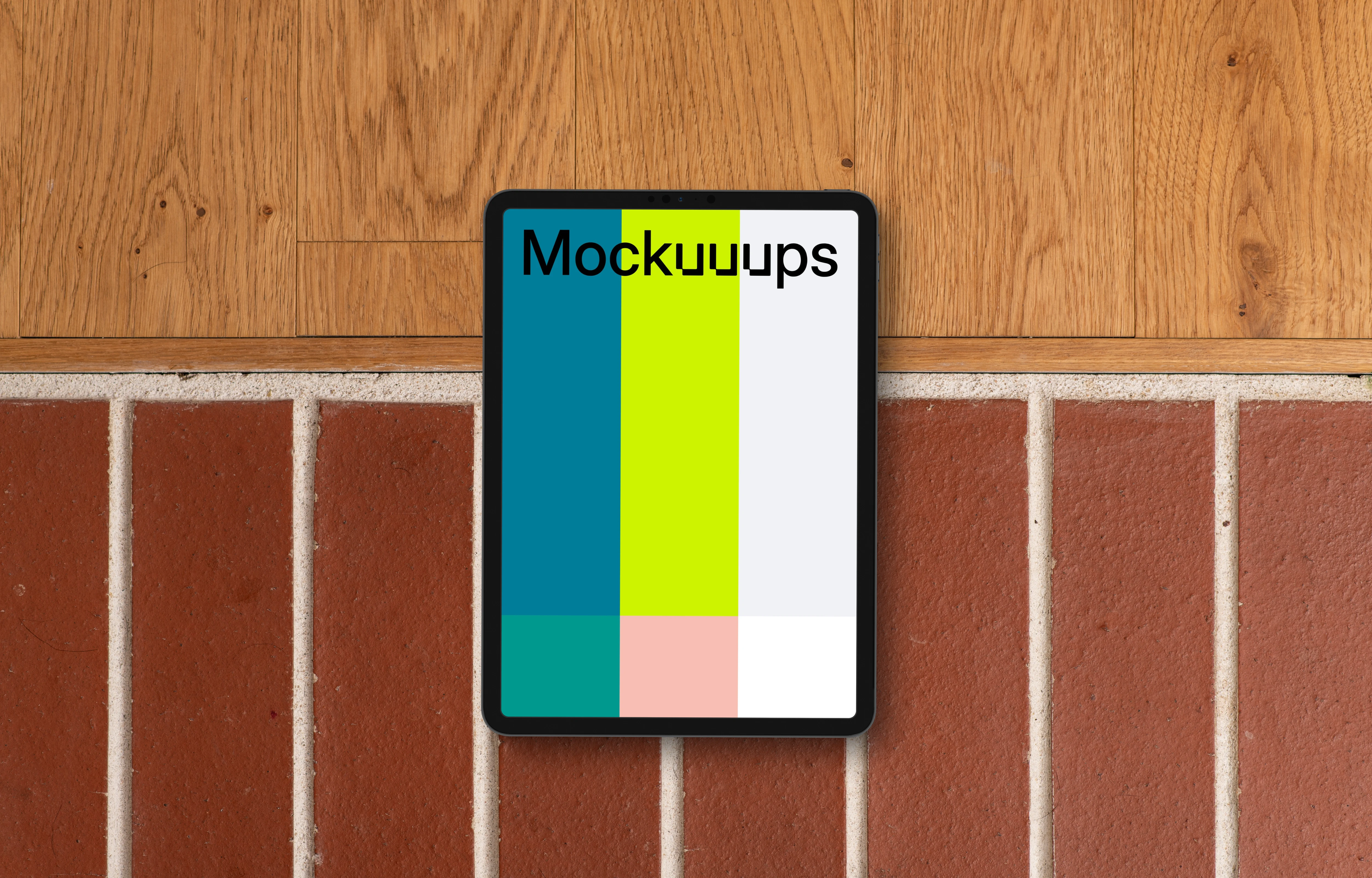Tablet mockup against brick and wood backdrop