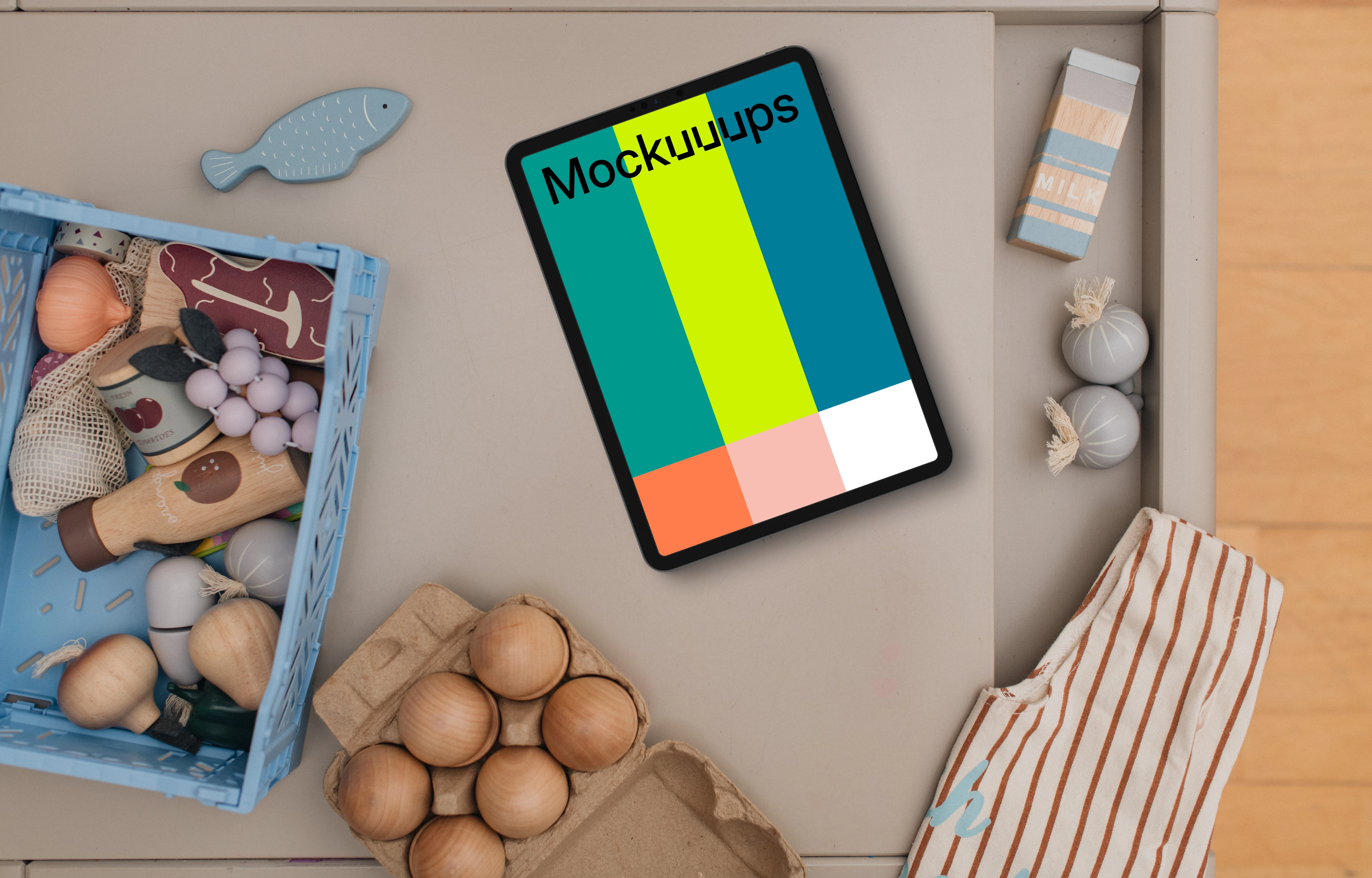 Tablet mockup with children's toys