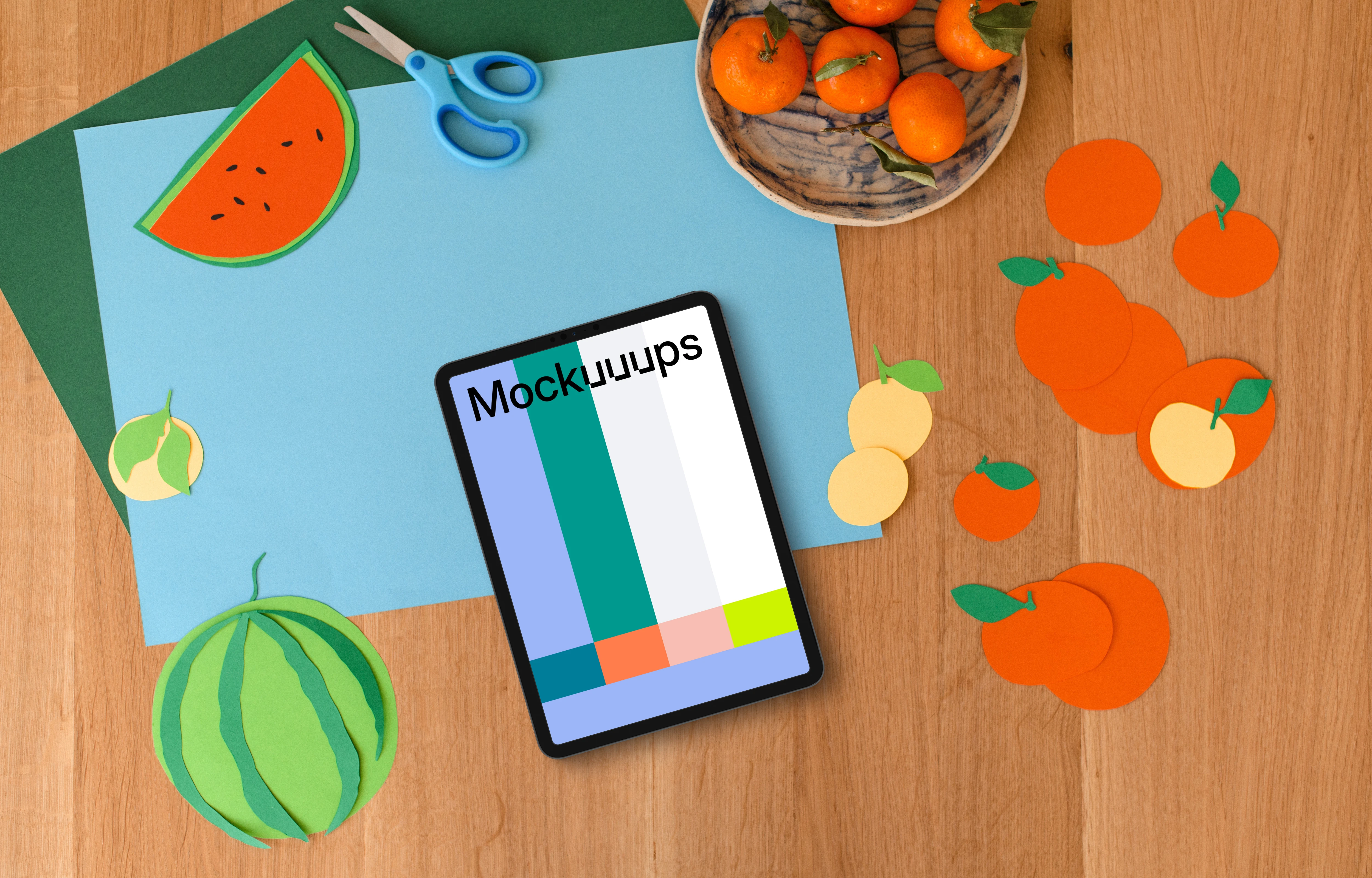 Tablet mockup with colorful fruit paper cutouts