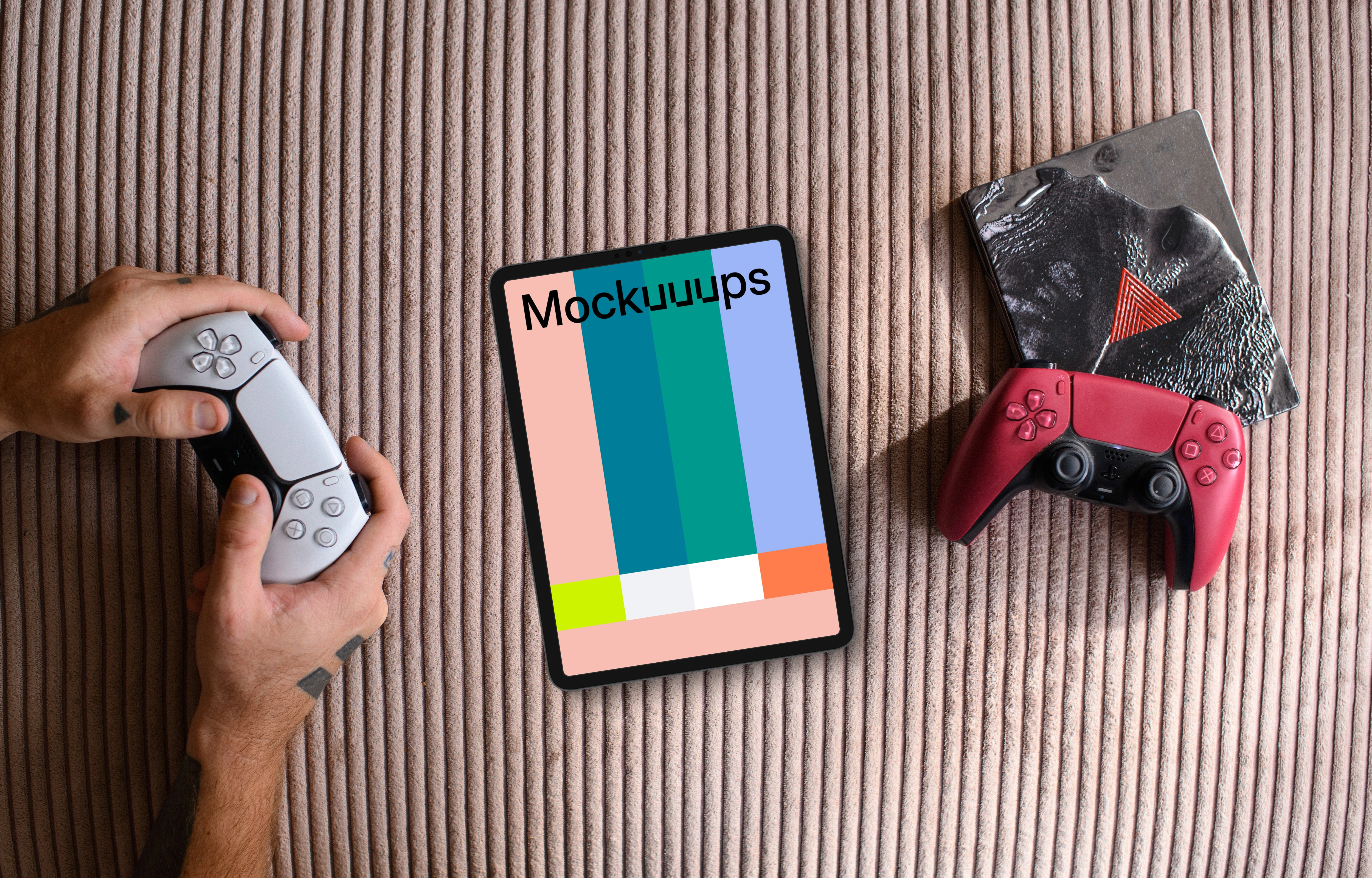 Tablet mockup with gaming controllers on textured background