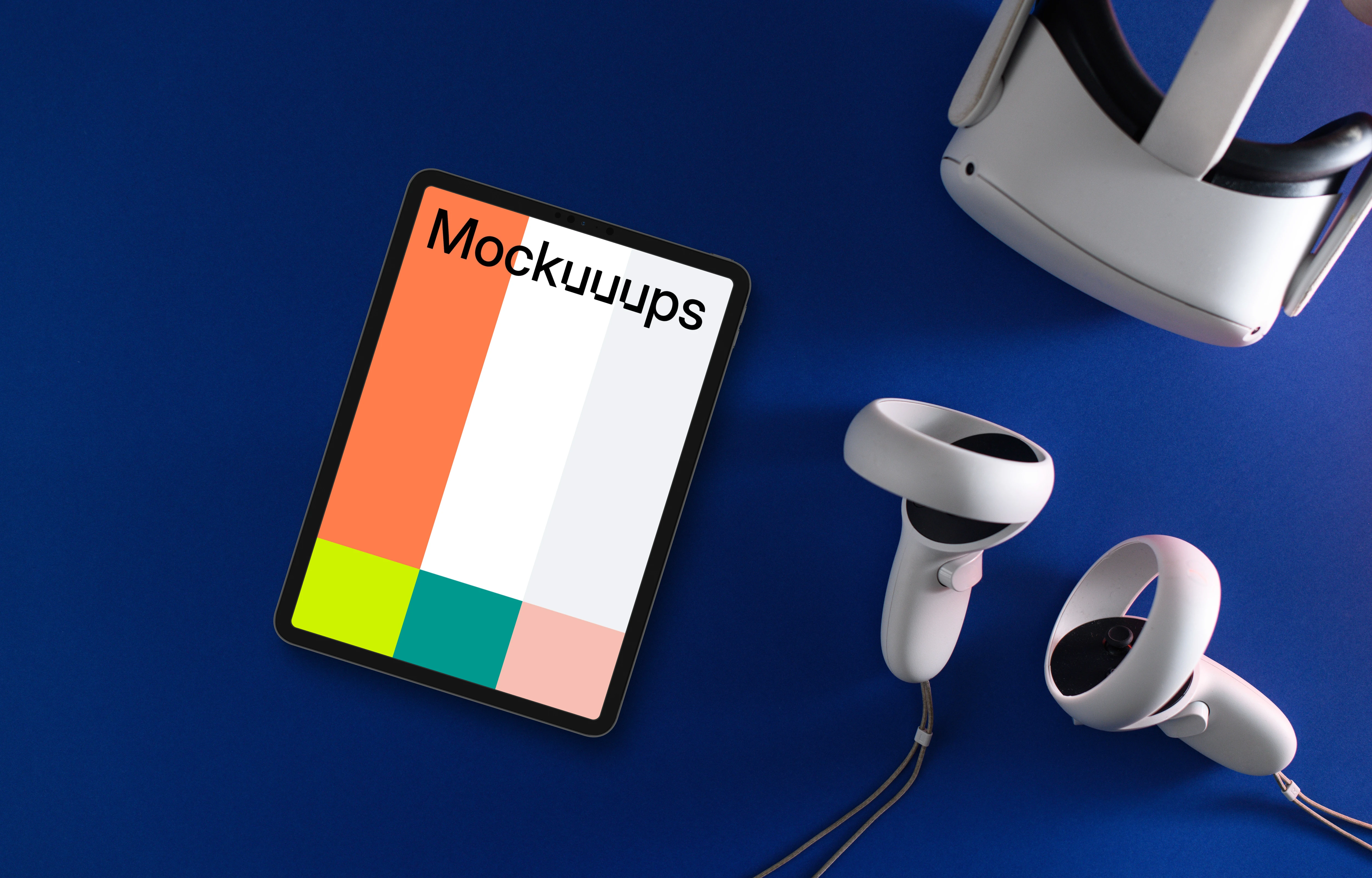 Tablet mockup with VR headset and headphones on blue background