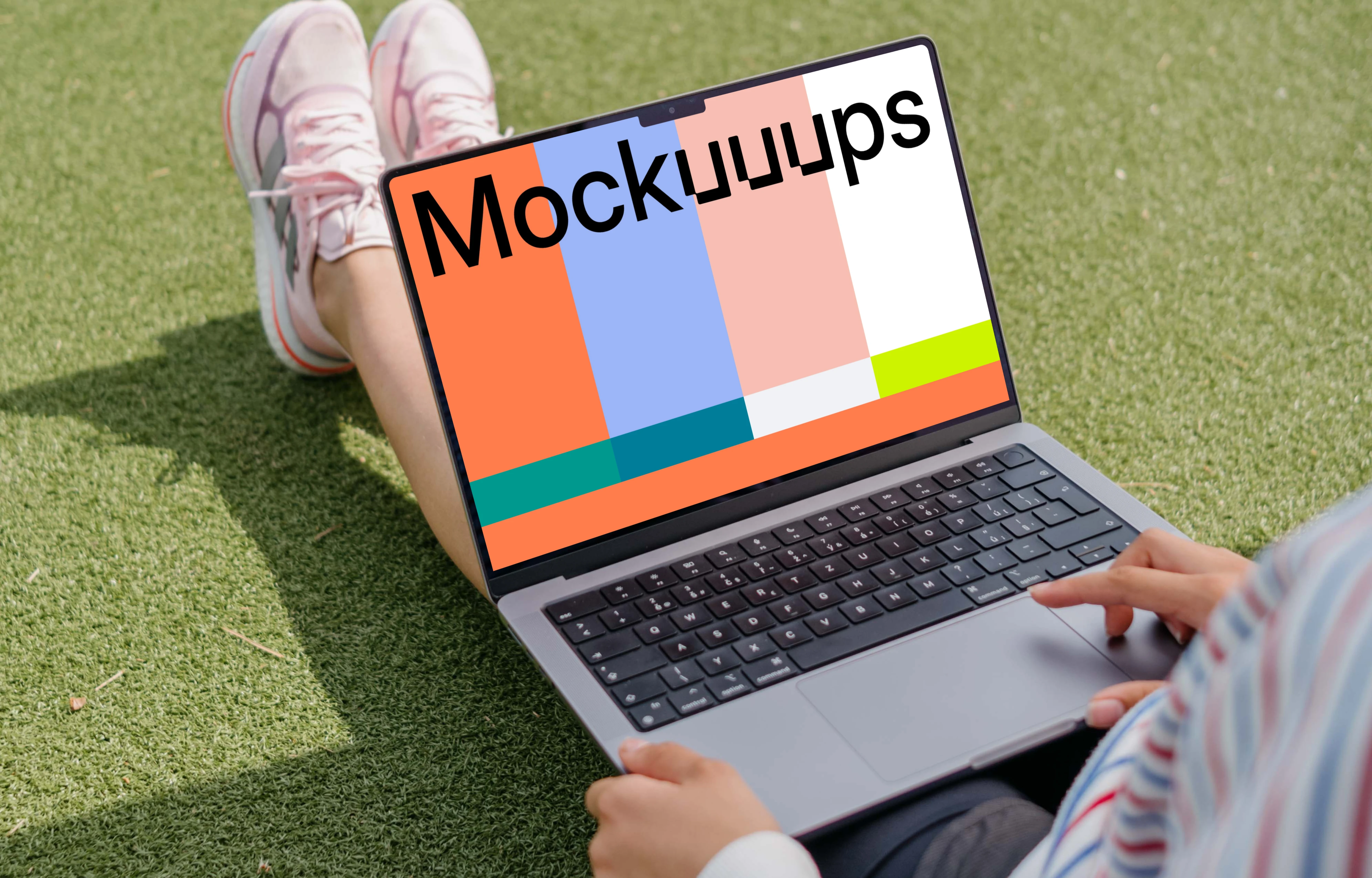 Woman hand scrolling on a MacBook Pro 14 mockup