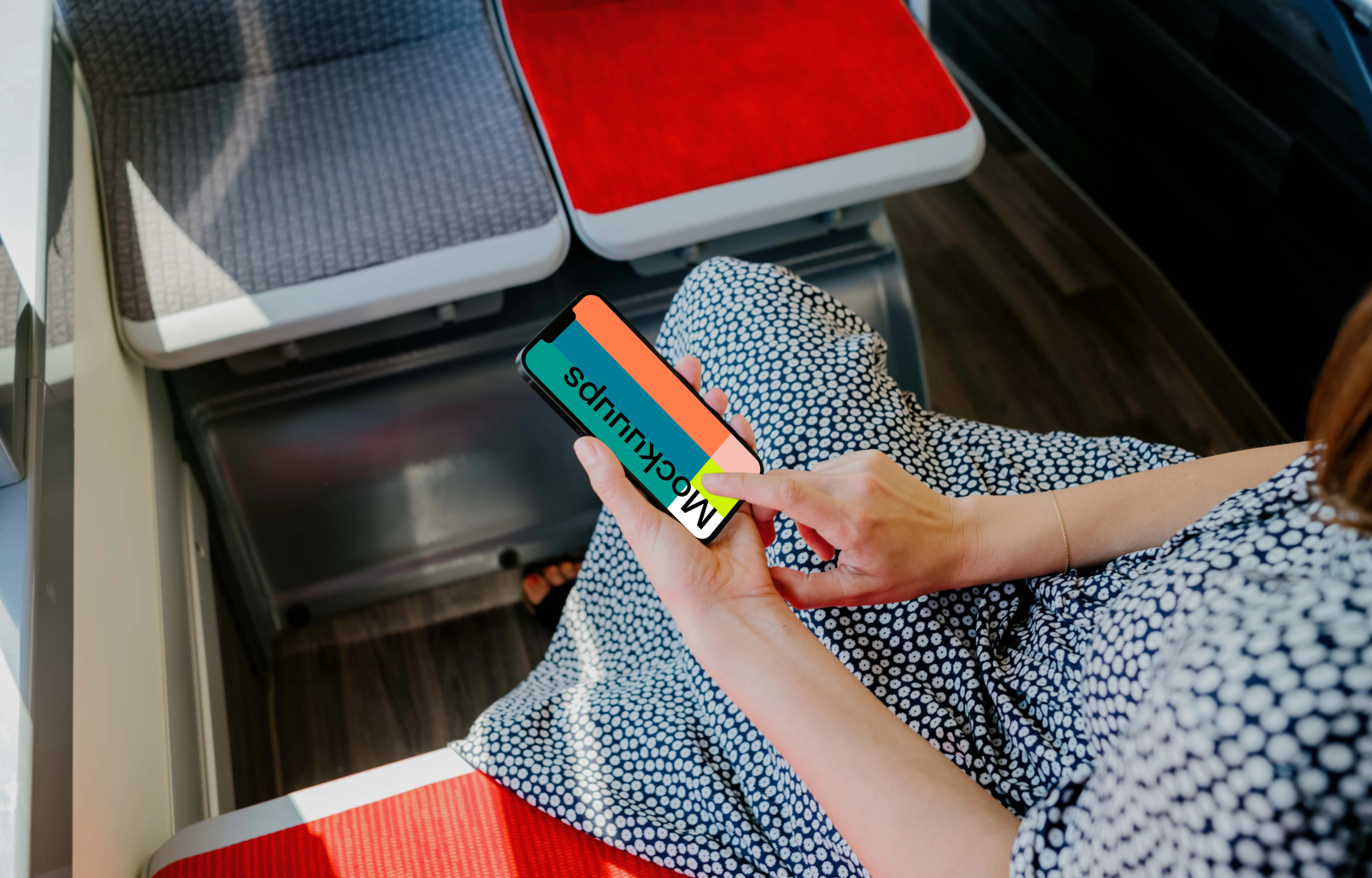 Woman hand typing on an iPhone 13 mockup