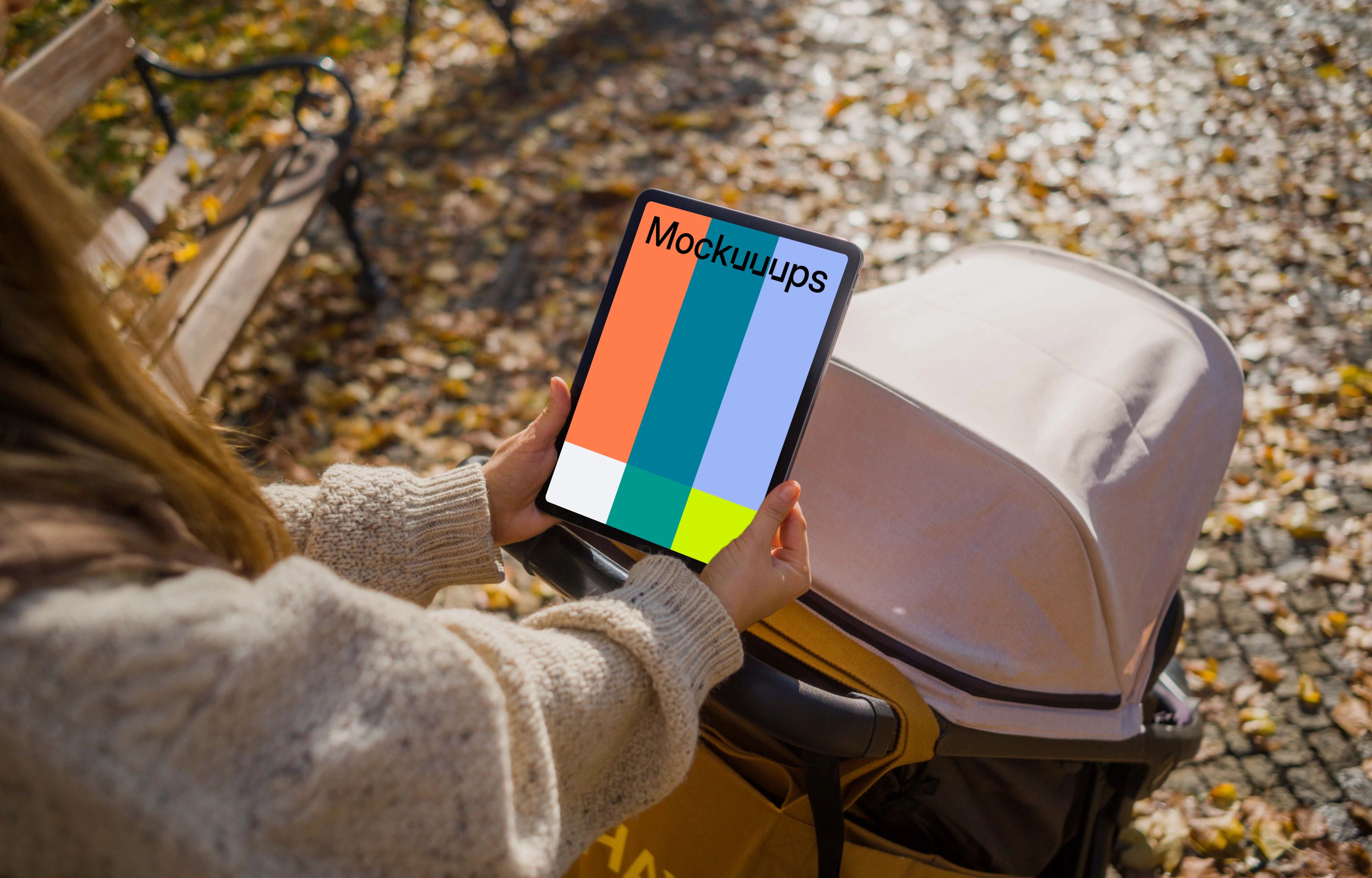 Woman hands holding an iPad Air in autumn season mockup