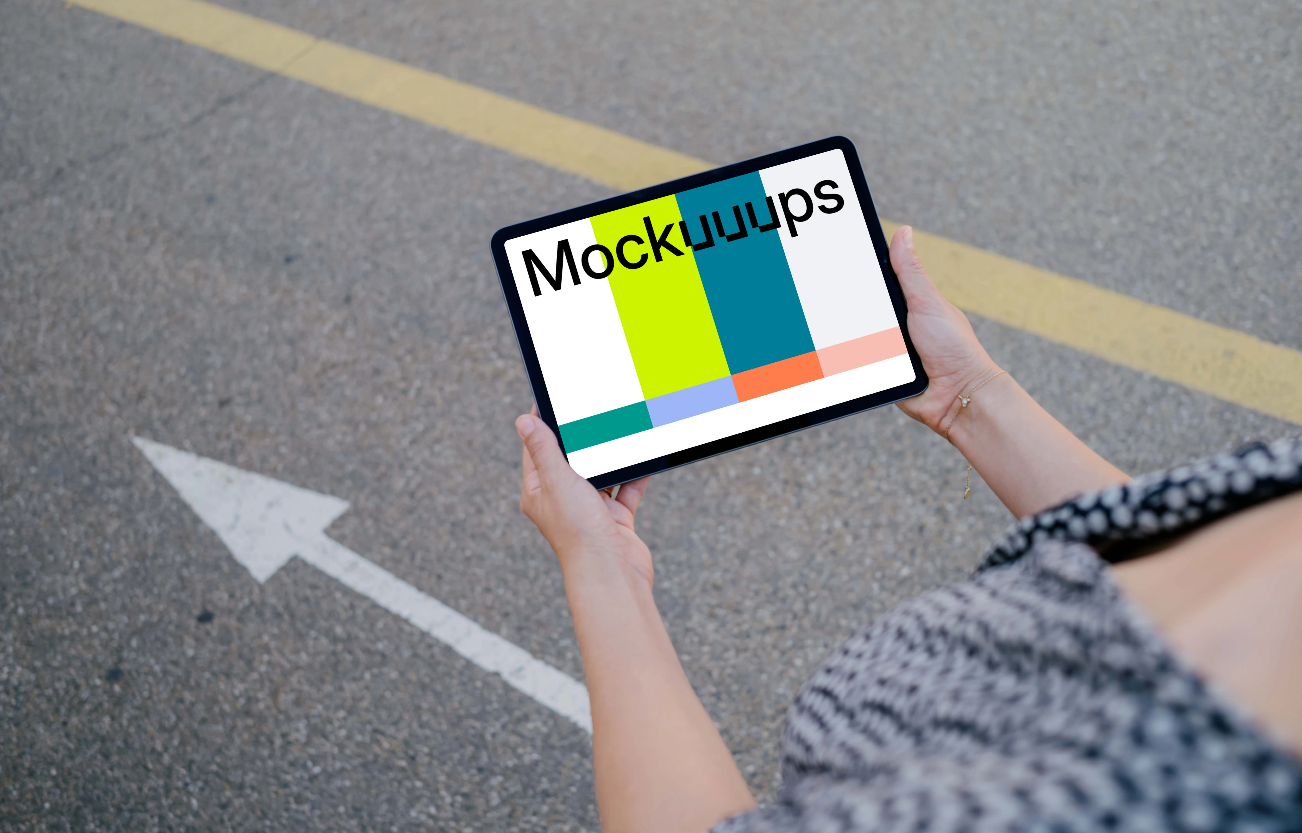 Woman hands holding an iPad mockup