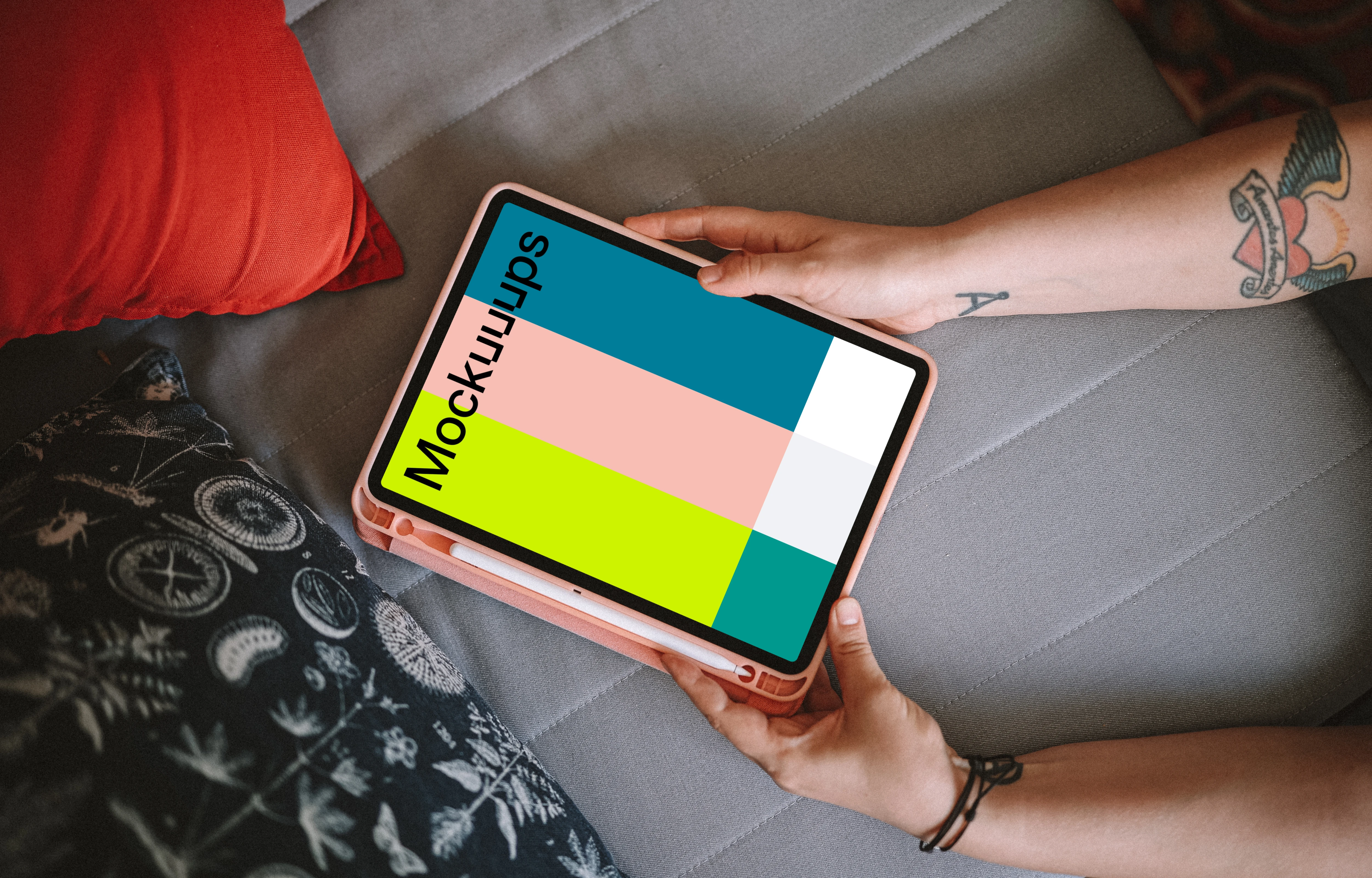 Woman holding an iPad Air mockup