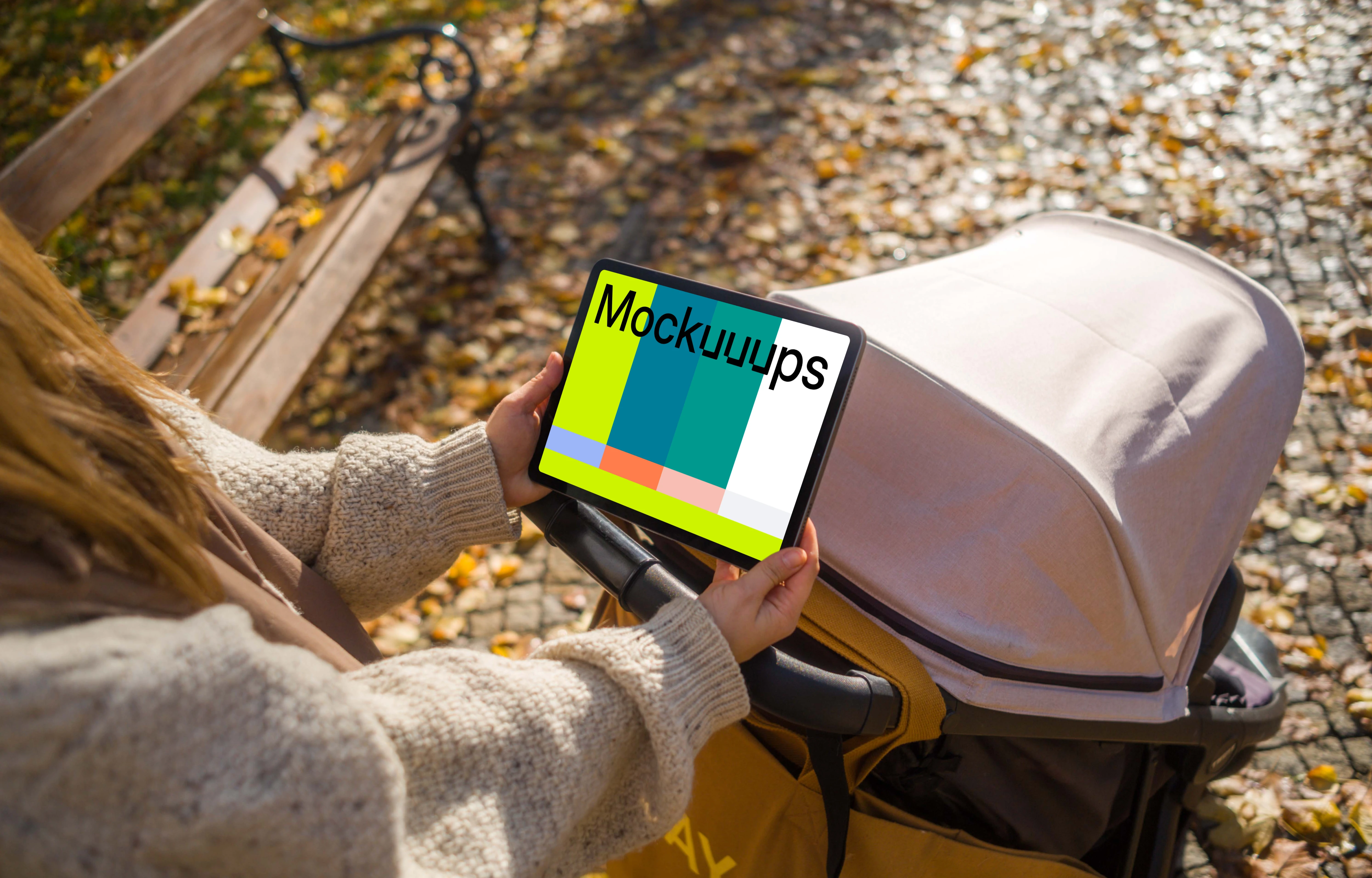 Woman with a baby stroller and tablet mockup