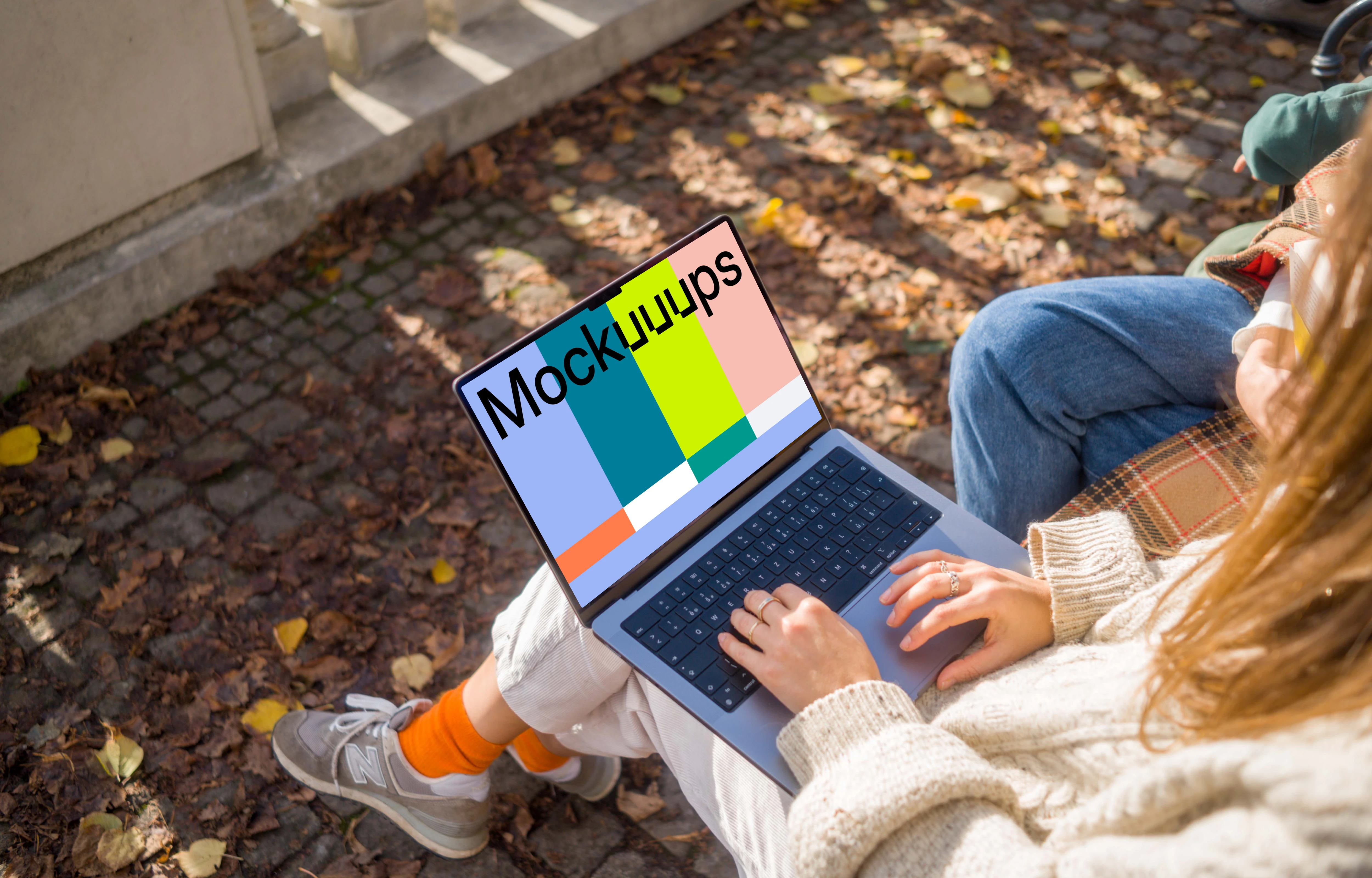 Woman working on a MacBook Pro 14 in autumn theme mockup