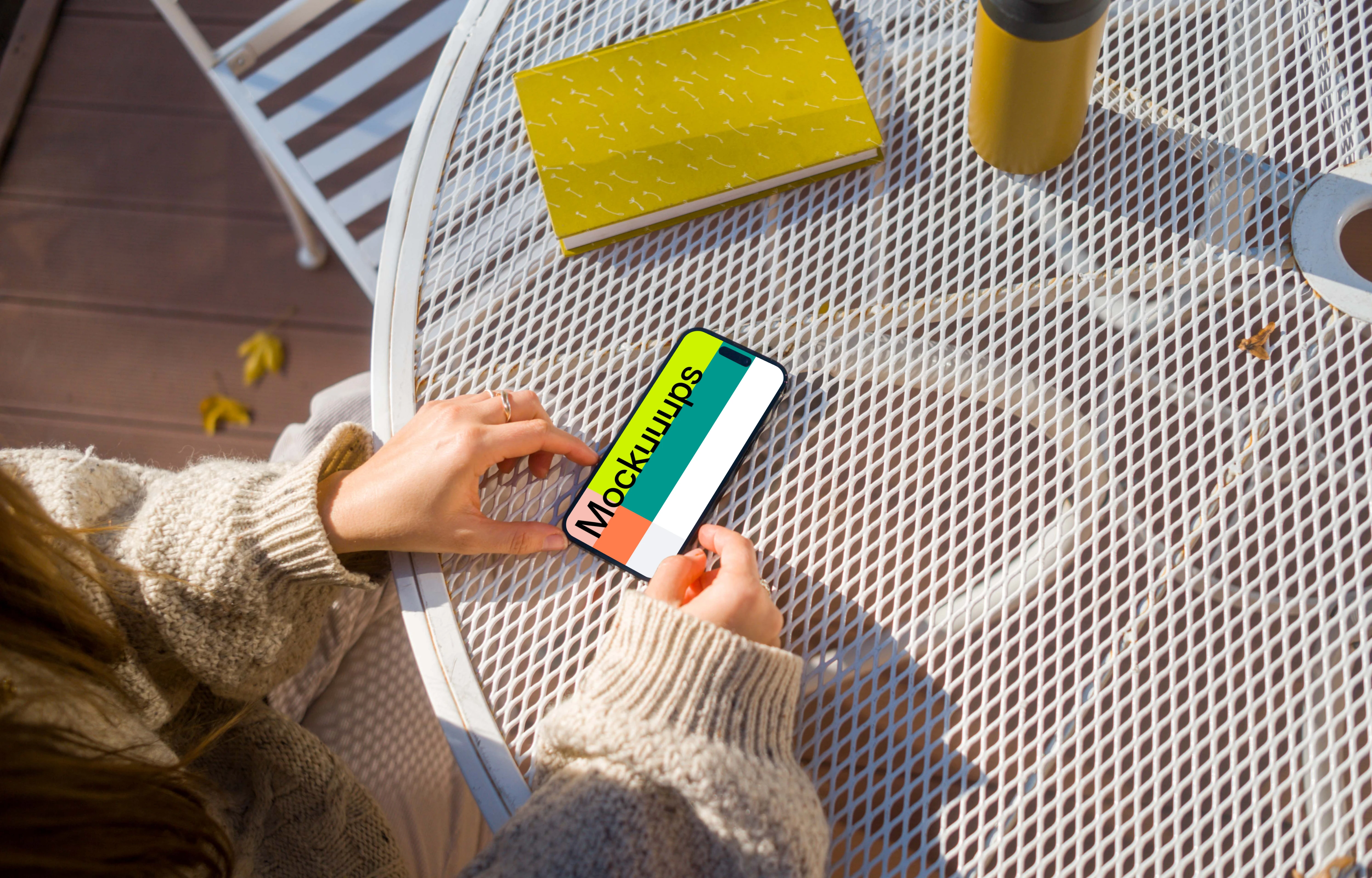 Woman working on an iPhone mockup