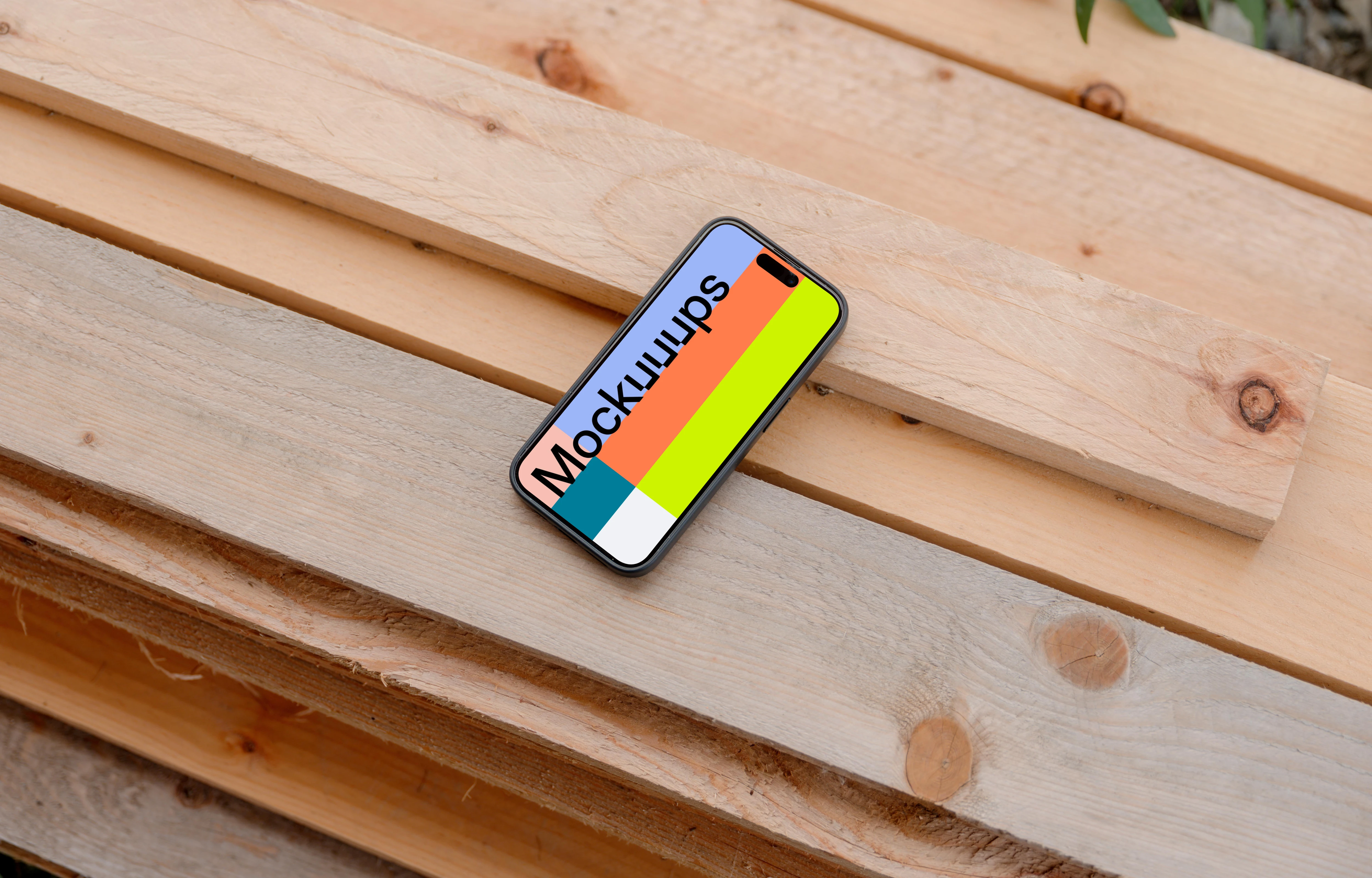 iPhone 15 Pro mockup on wooden boards