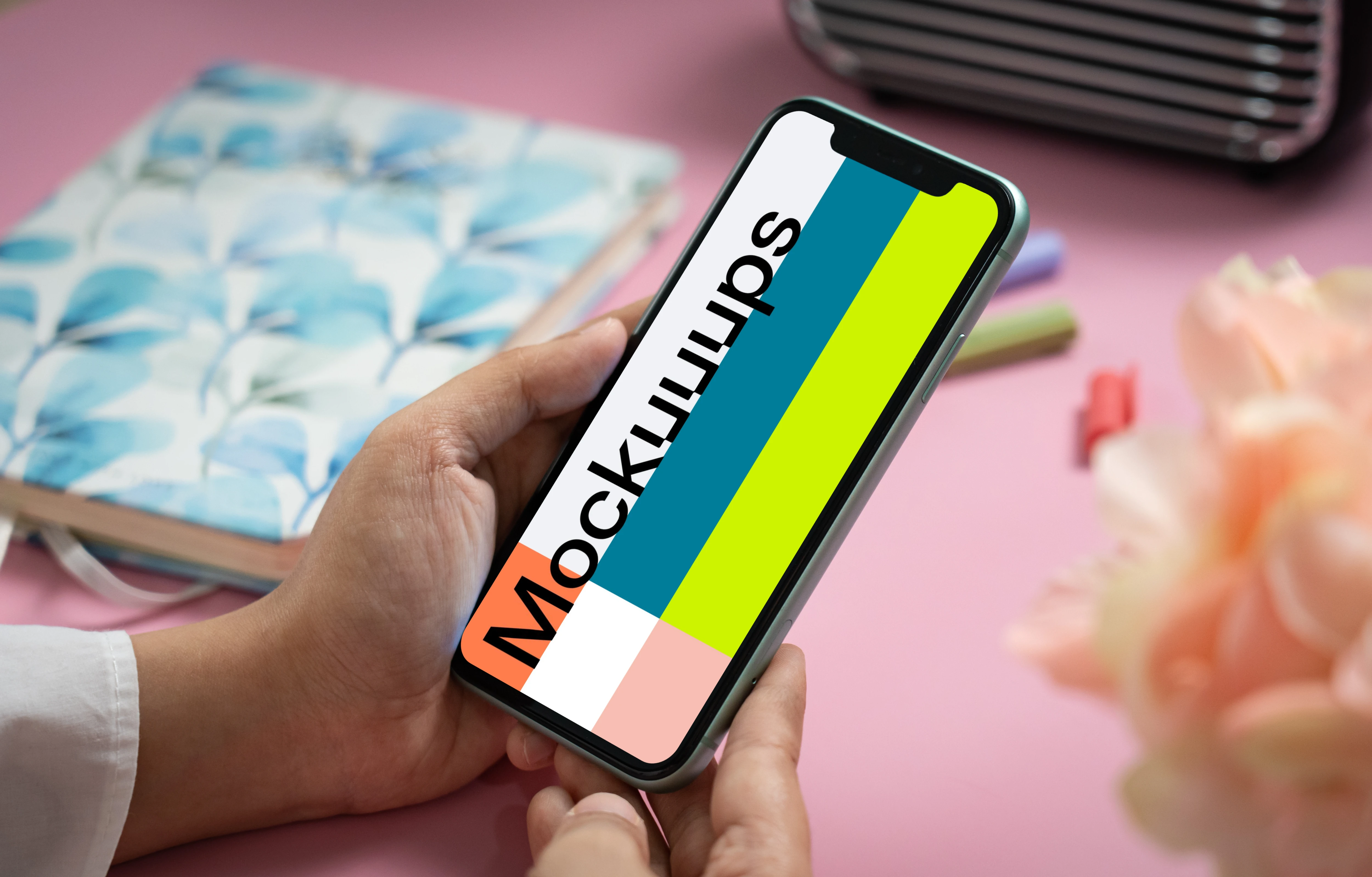 User holding an iPhone 11 mockup