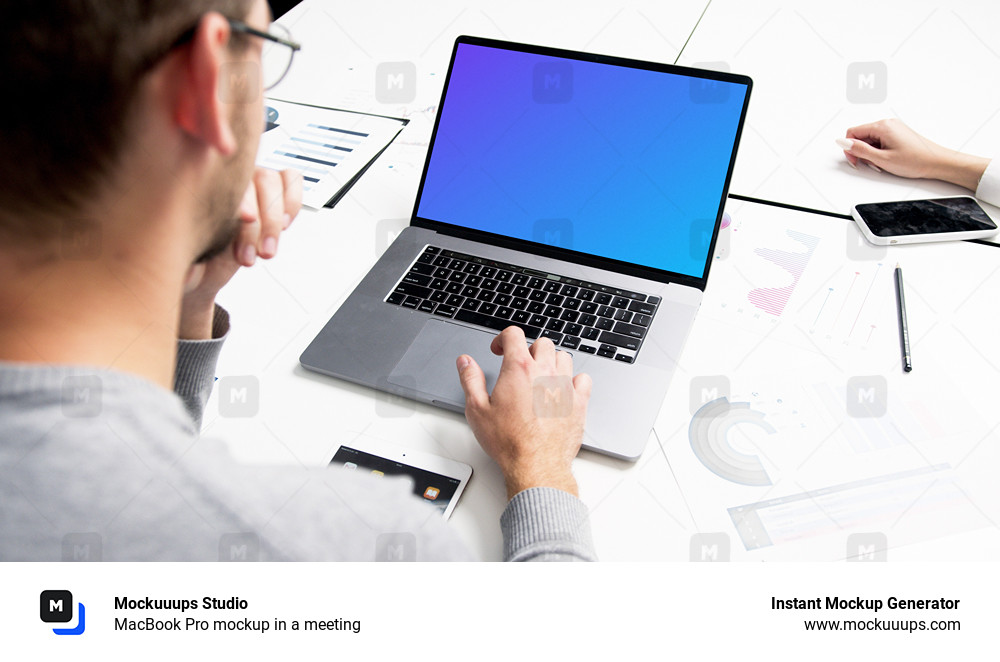 MacBook Pro mockup in a meeting