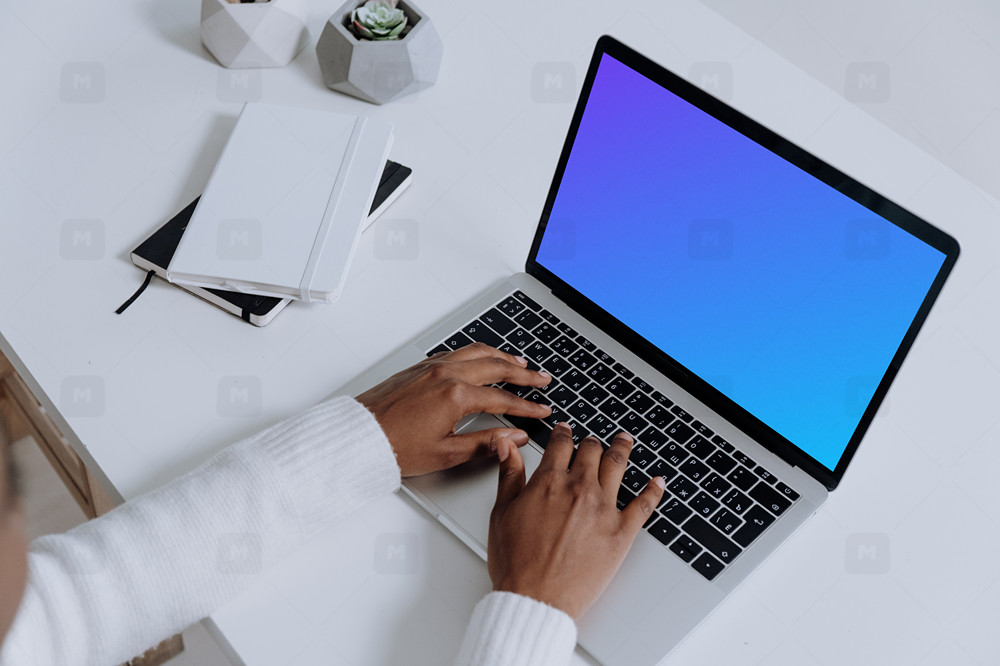 MacBook Pro mockup on a white table