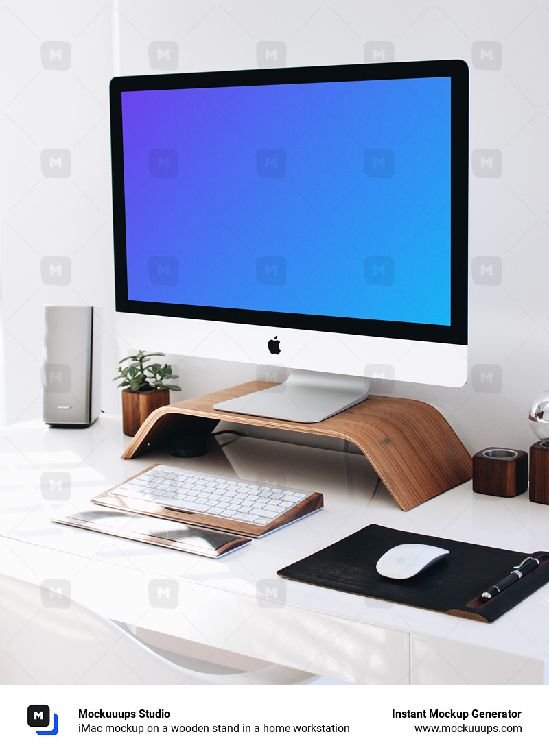 iMac mockup on a wooden stand in a home workstation