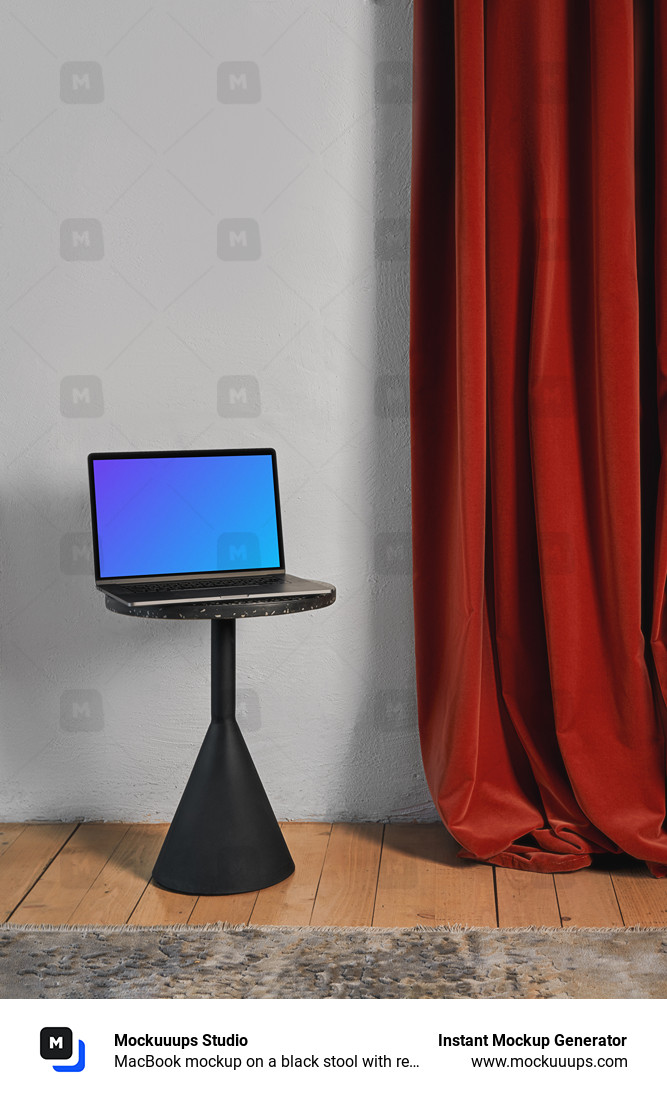 MacBook mockup on a black stool with red curtain in the background