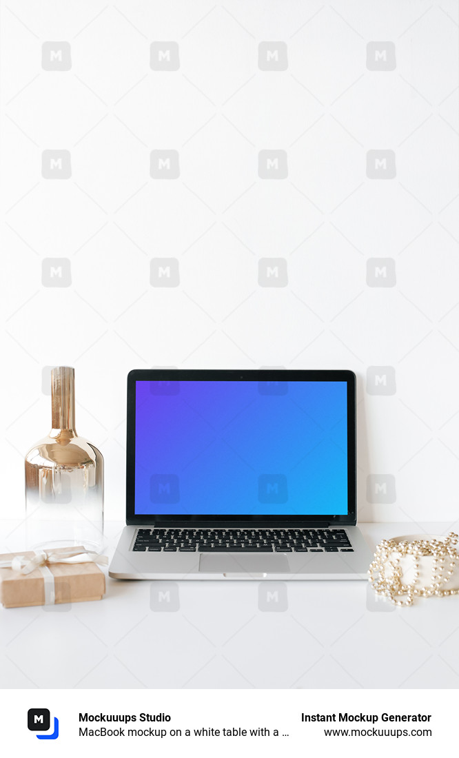 MacBook mockup on a white table with a glass jar at the side