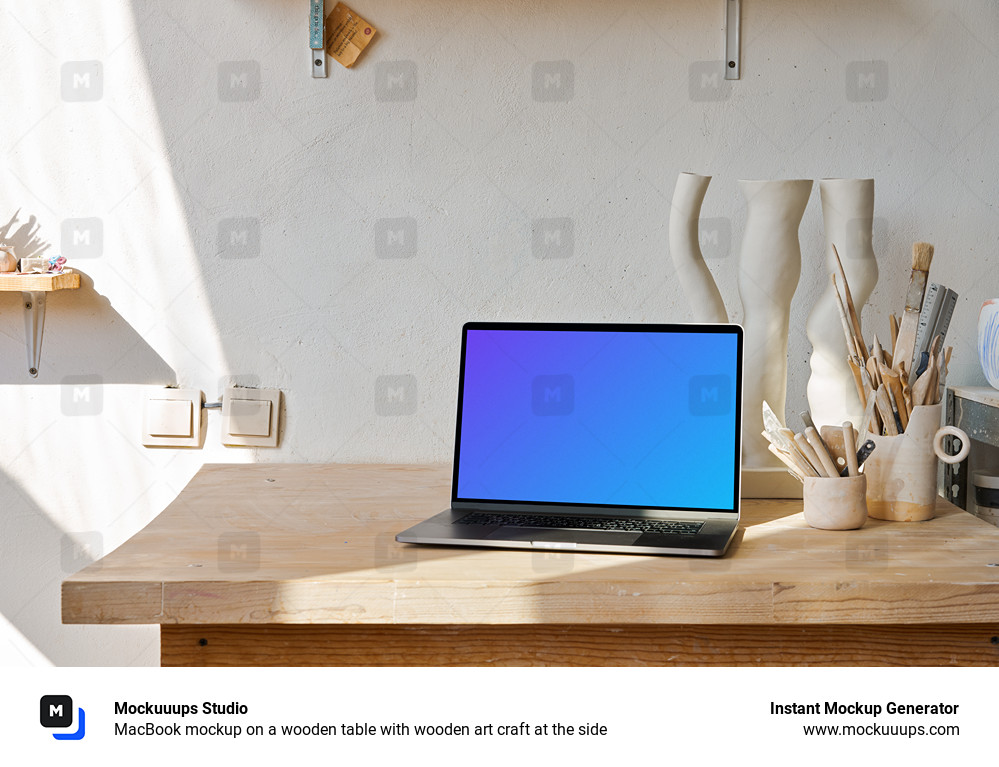 MacBook mockup on a wooden table with wooden art craft at the side