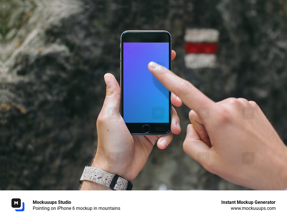 Pointing on iPhone 6 mockup in mountains