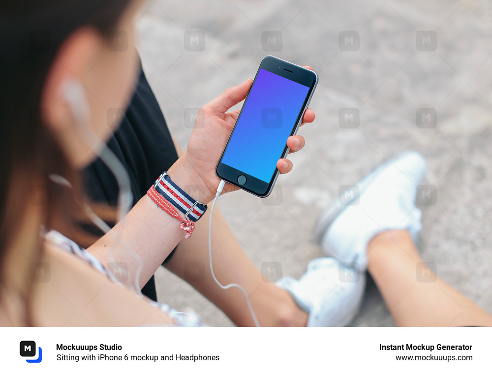Sitting with iPhone 6 mockup and Headphones